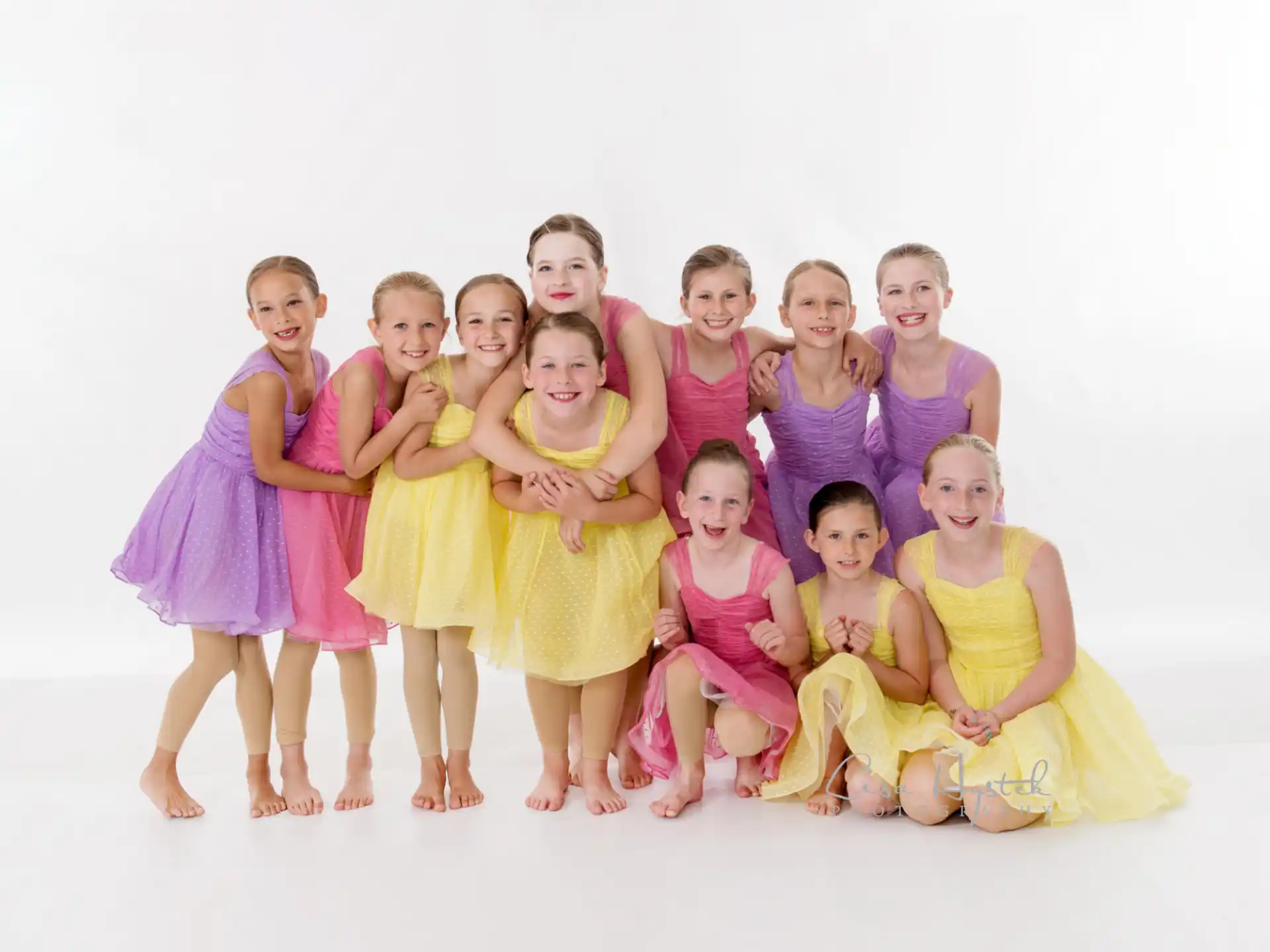 a group of girls posing for a photo