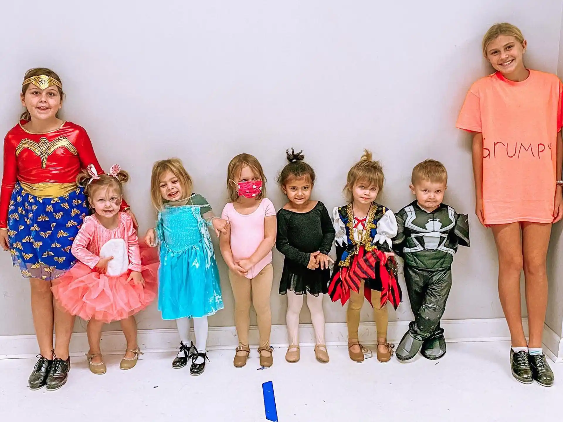 a group of children posing for a photo
