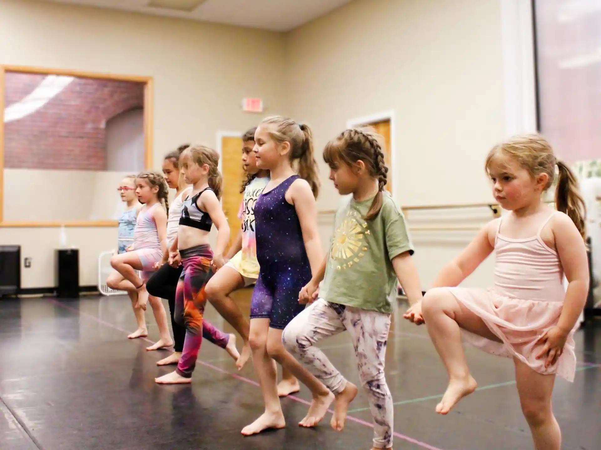 a group of girls dancing