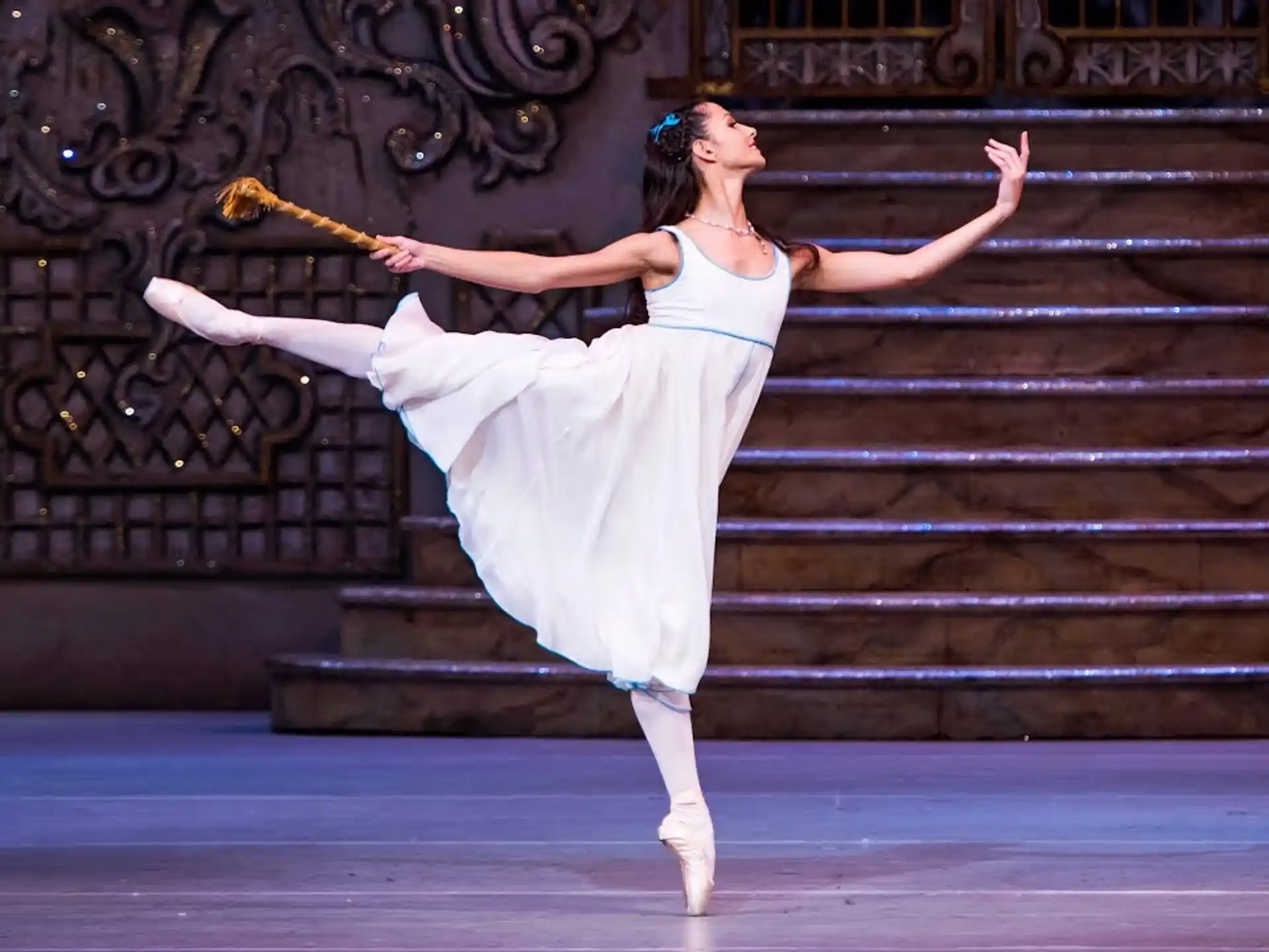 a woman dancing on a stage