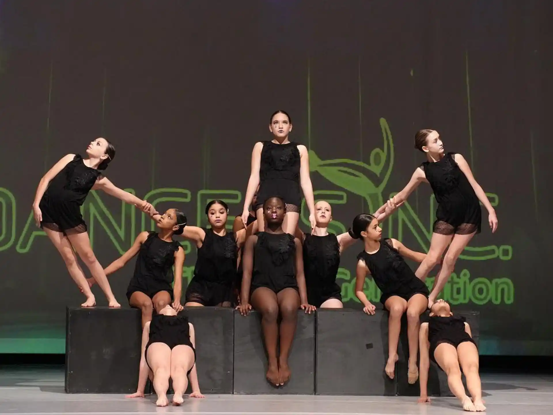 a group of women on a stage