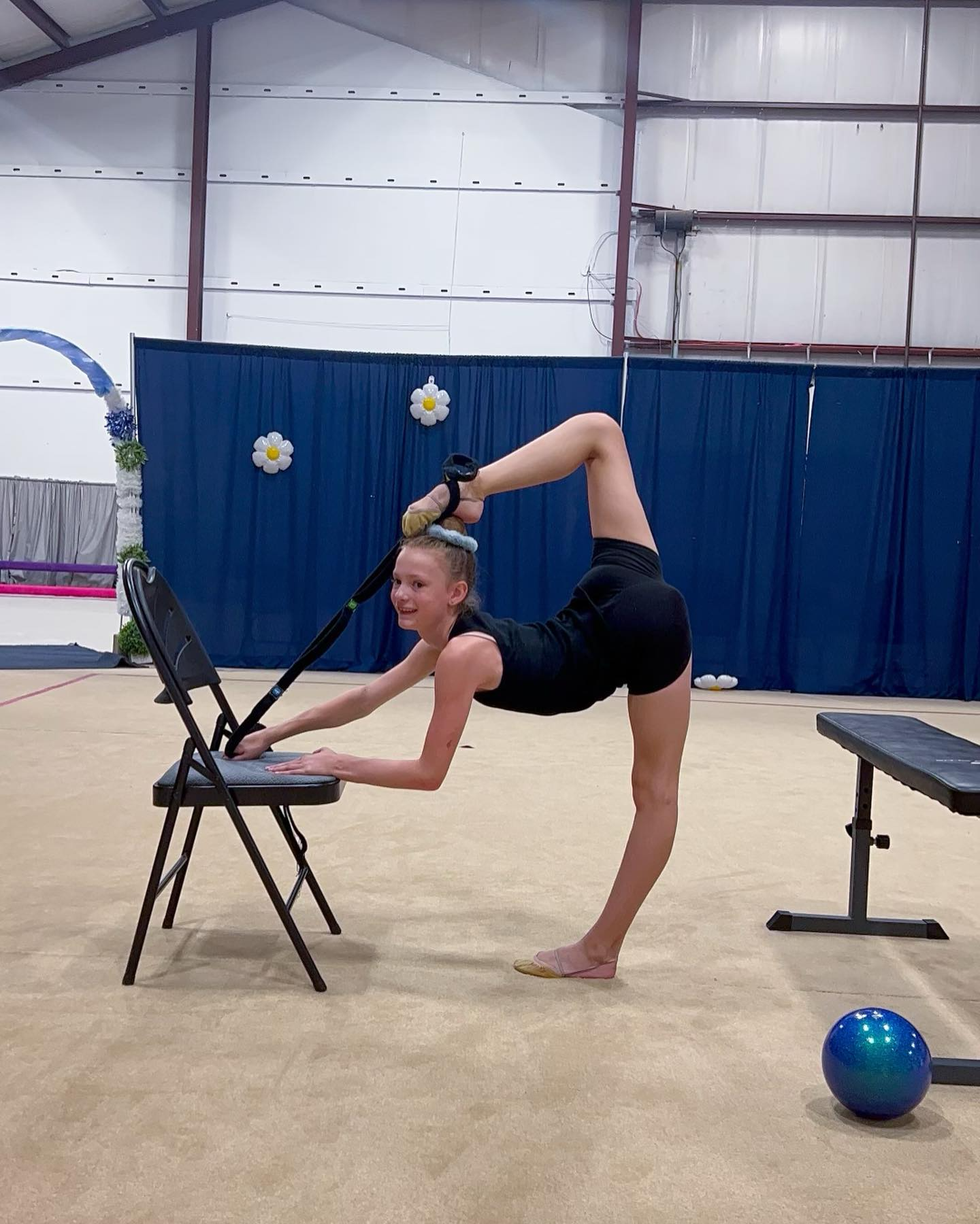 a person holding a ball