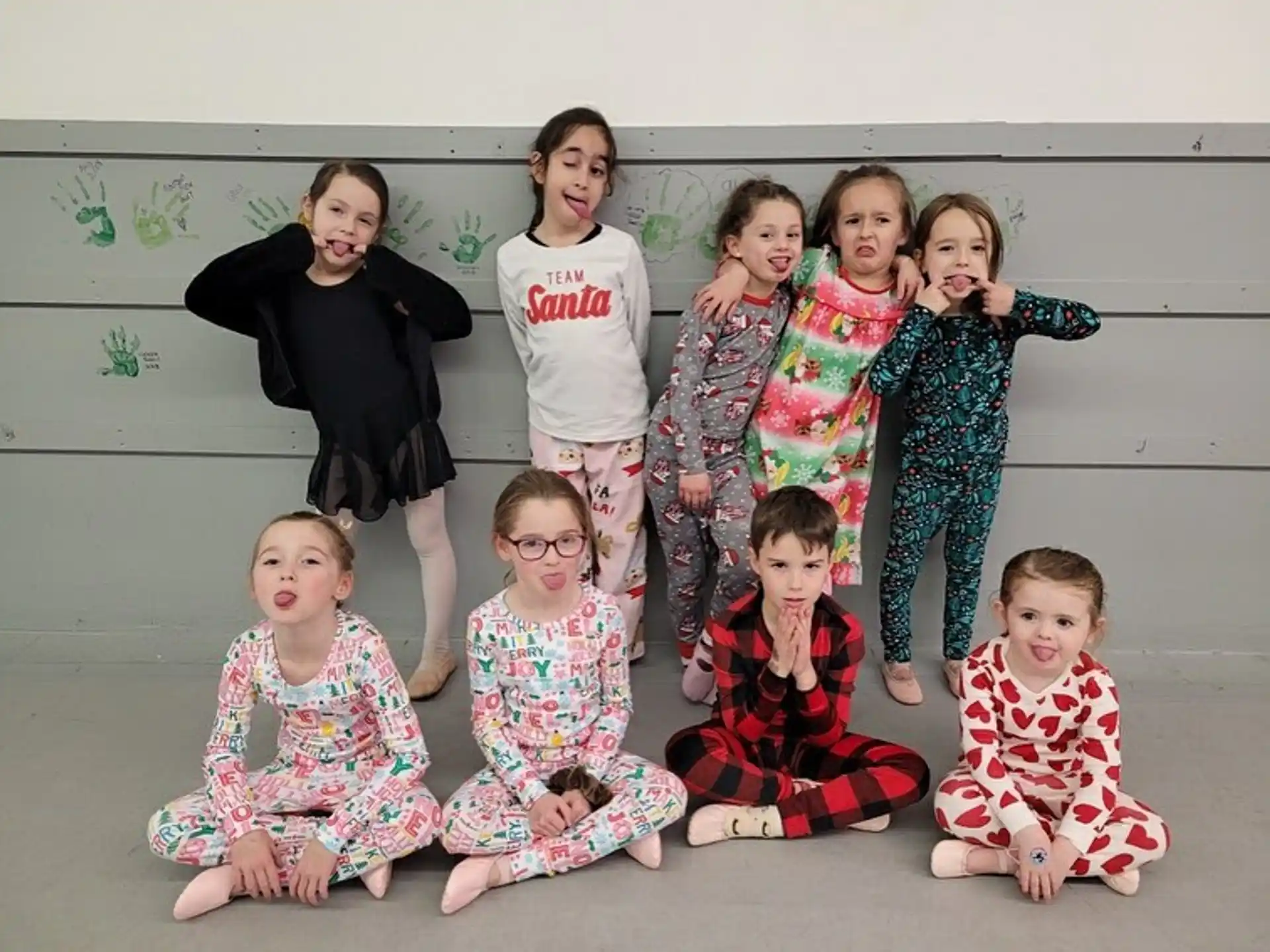 a group of children posing for a photo