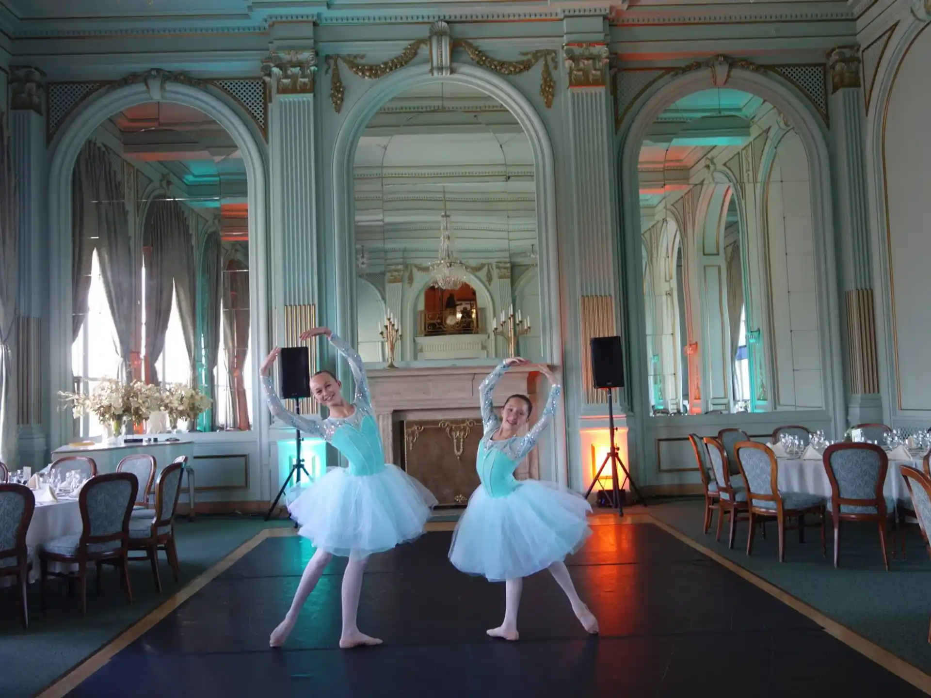 two women dancing in a room