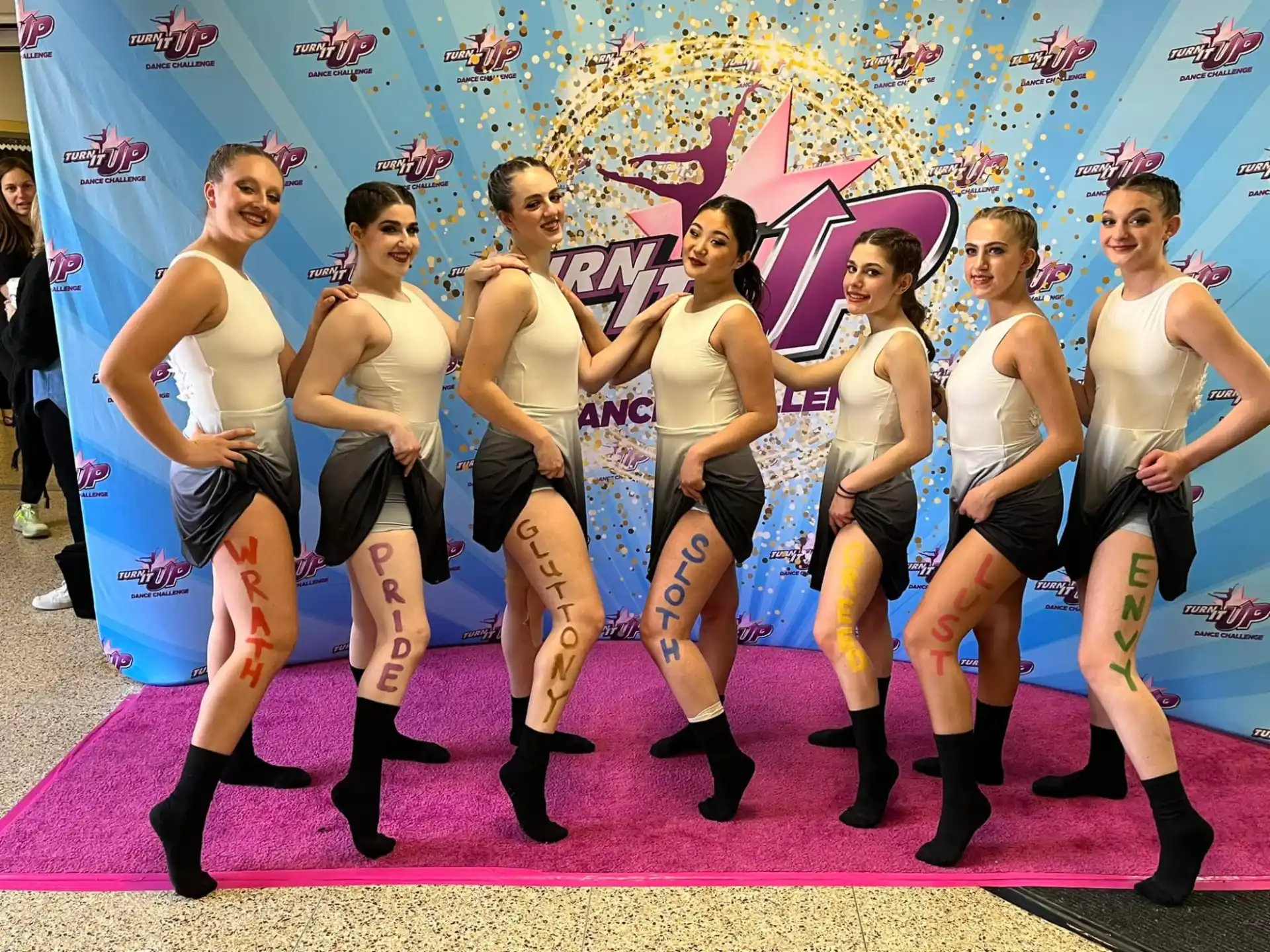 a group of women posing for a picture