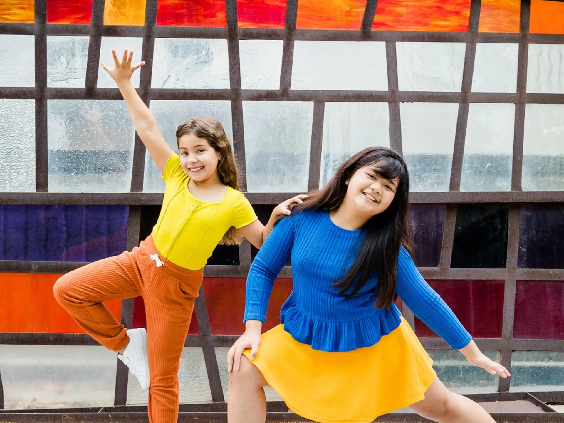 two women in yellow shirts