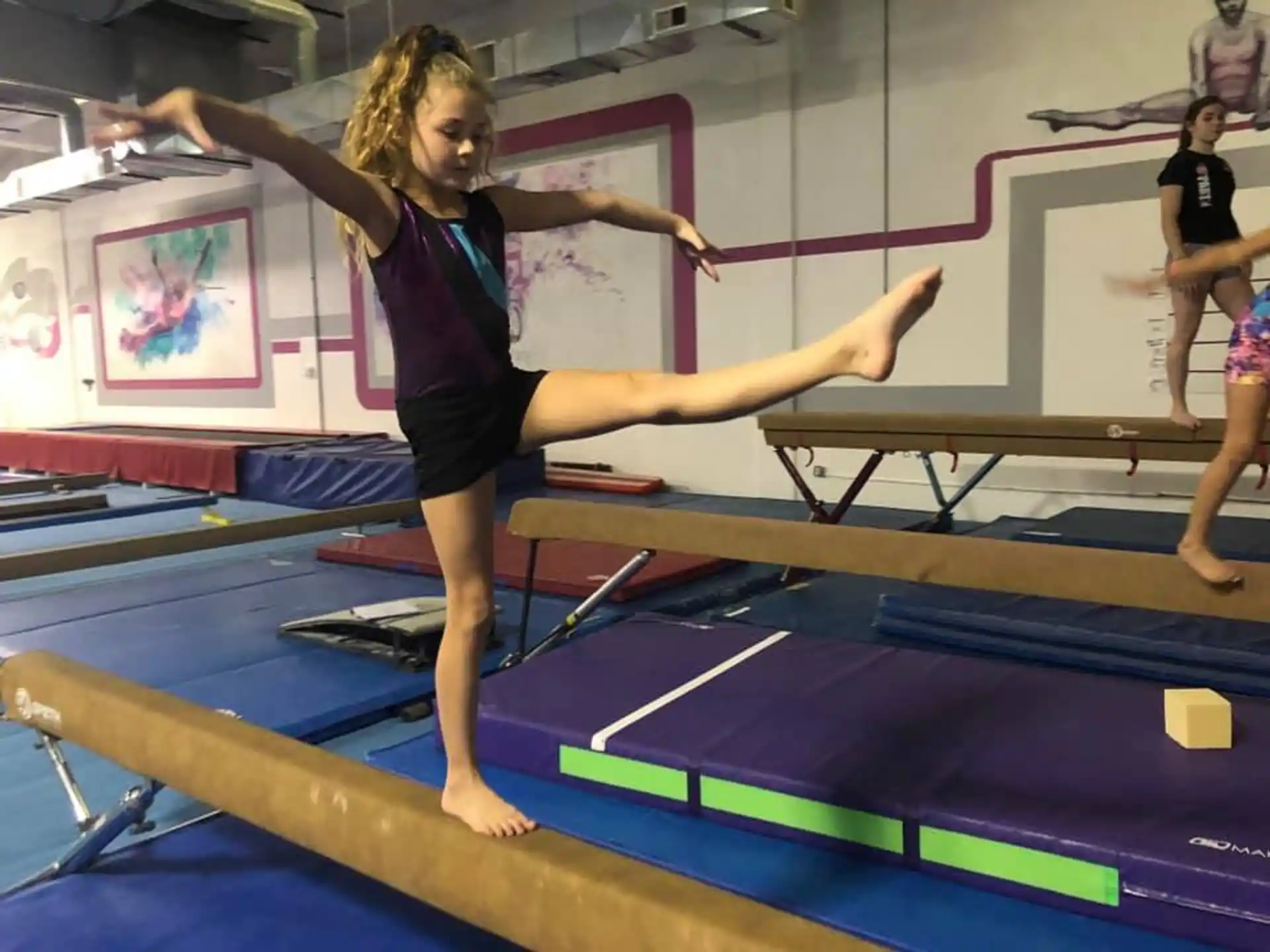 a woman doing gymnastics