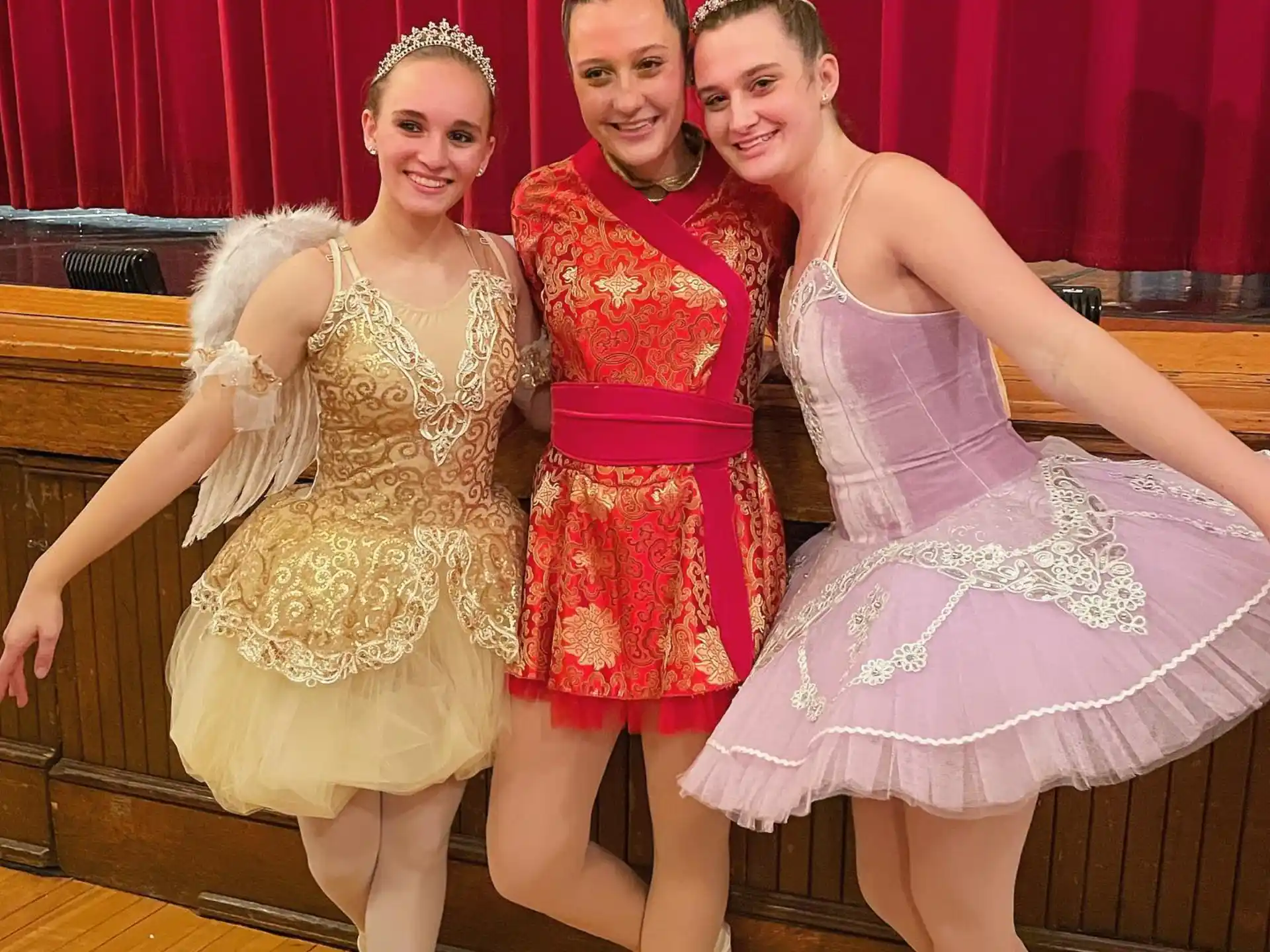 a group of women in dresses