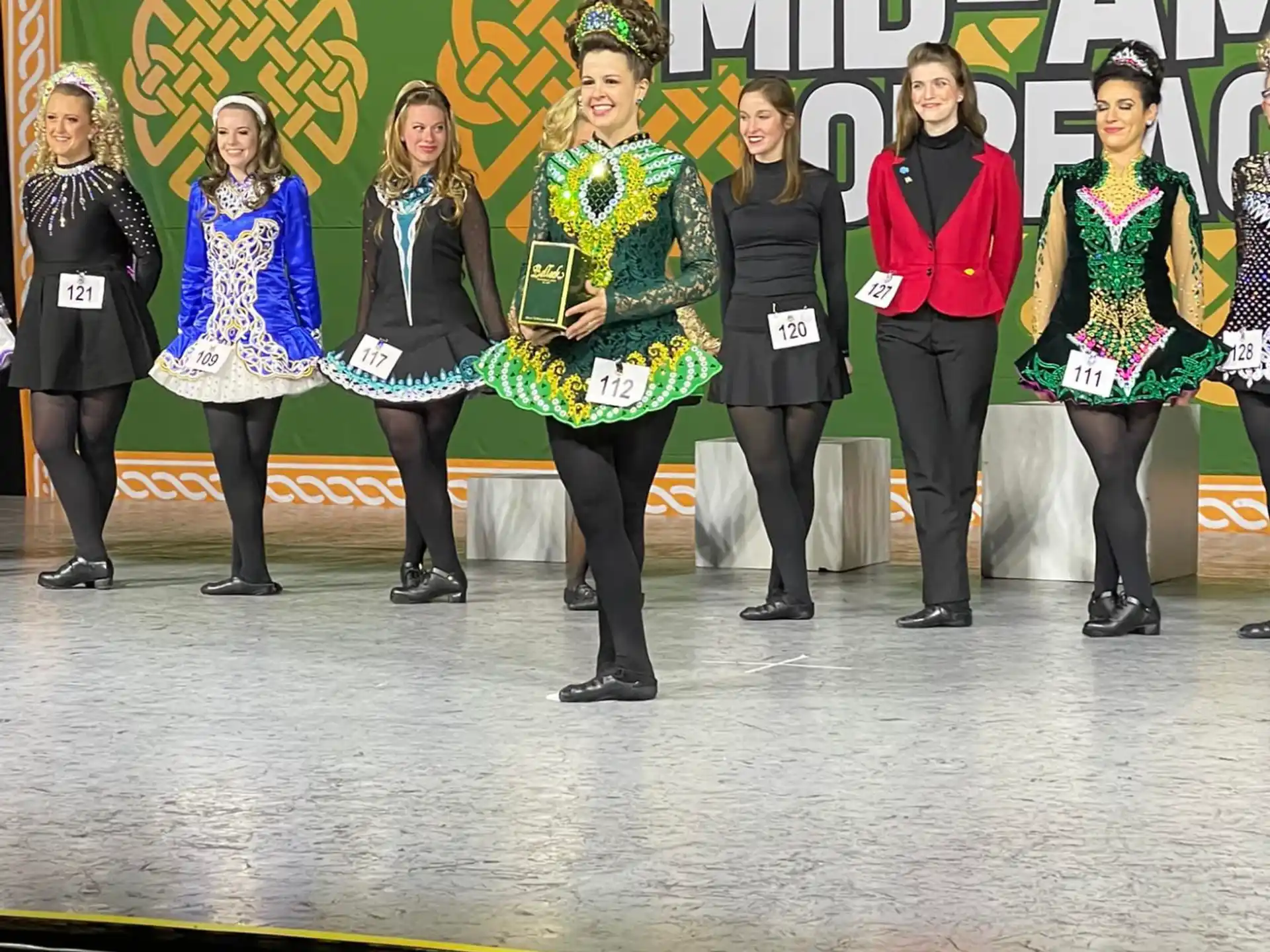a group of people standing on a stage