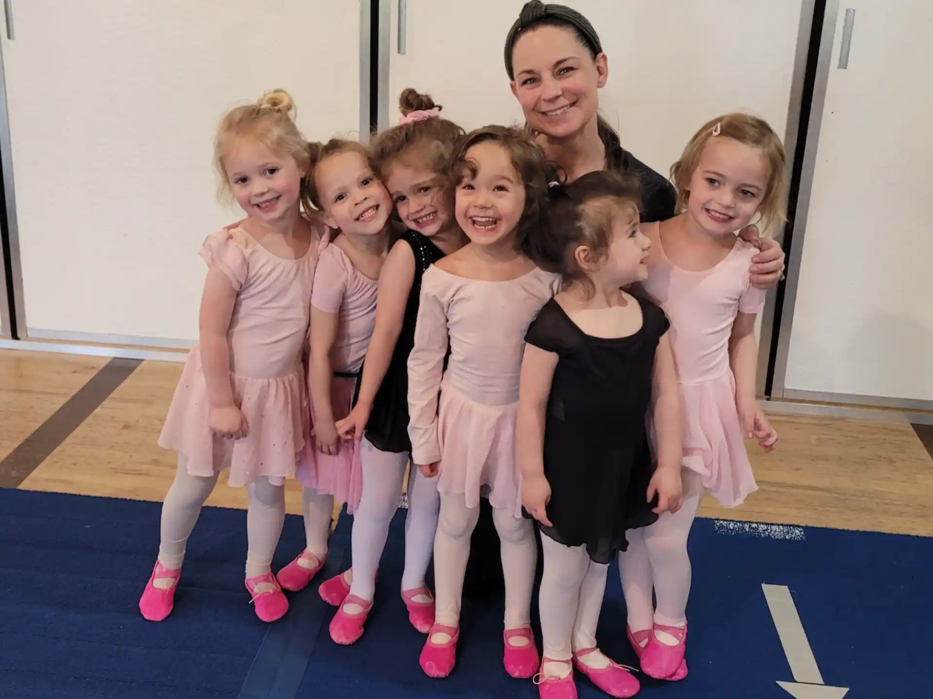 a person and a group of girls
