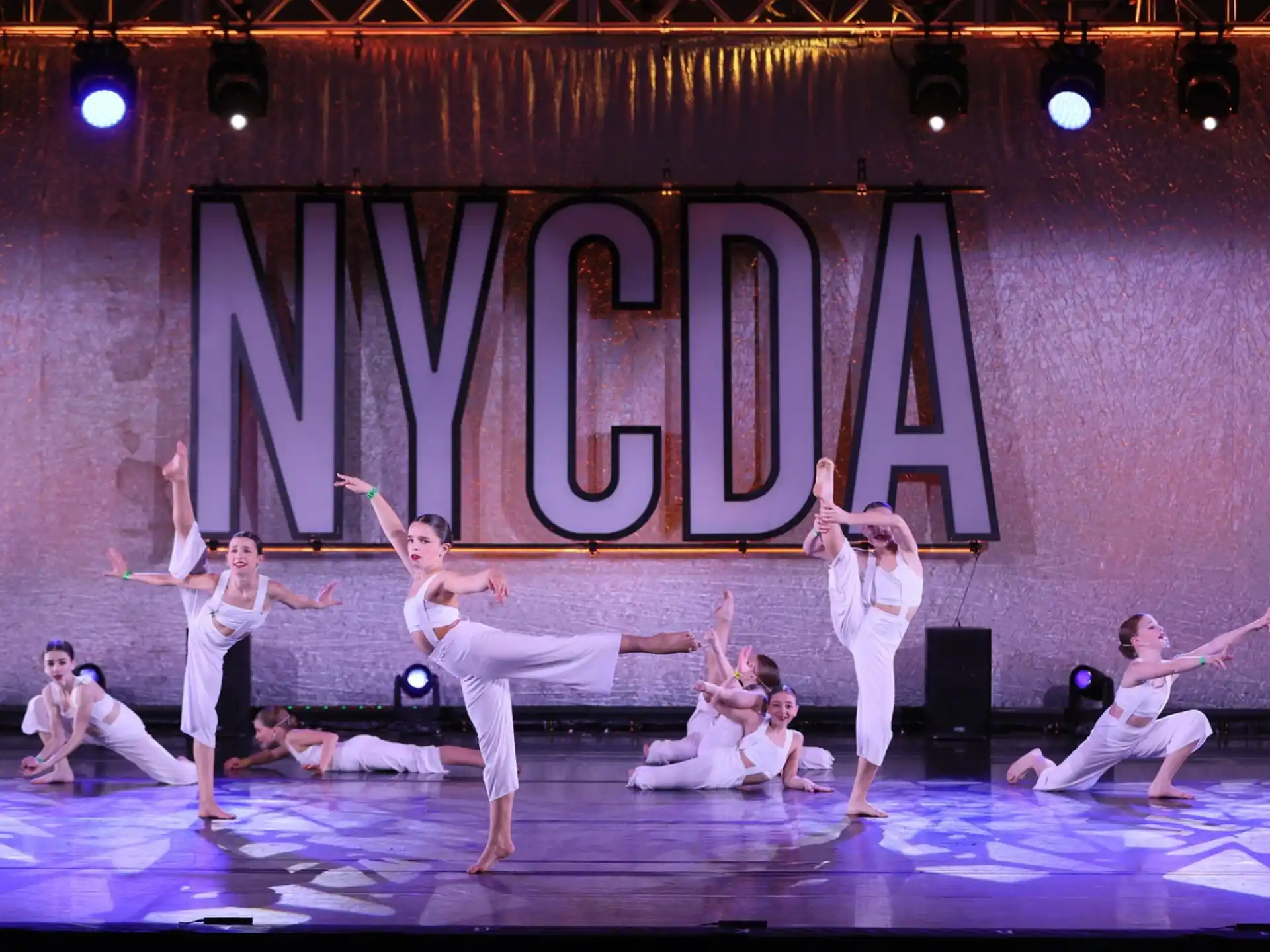 a group of people performing on a stage