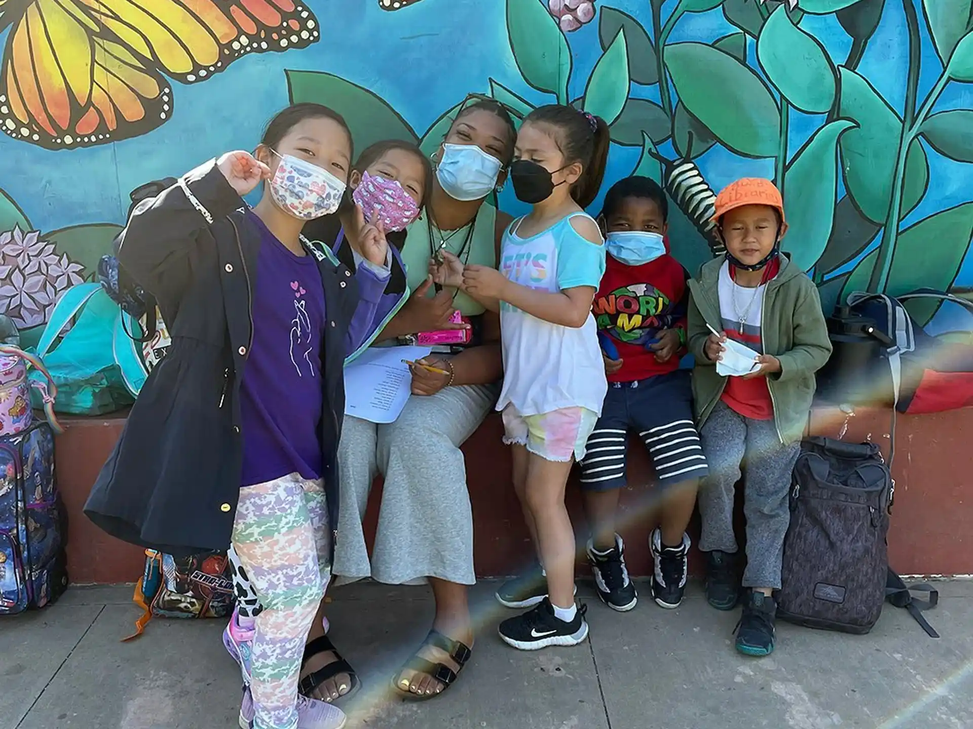 a group of people posing for a photo