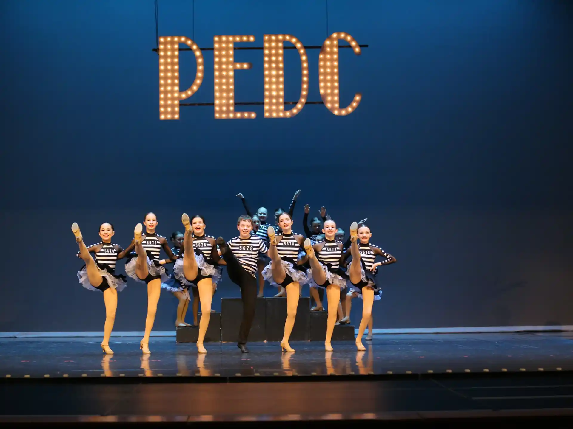 a group of women on a stage