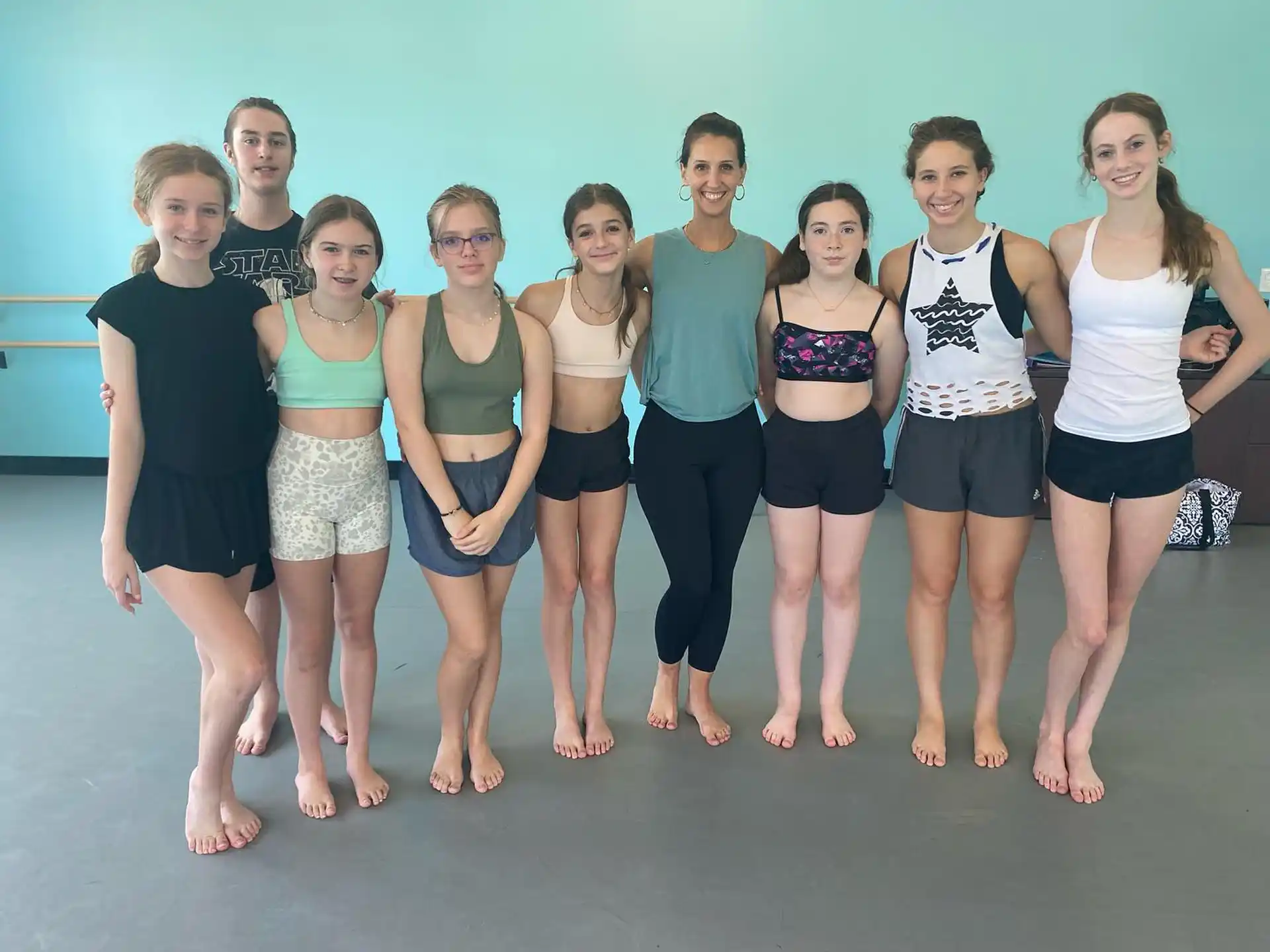 a group of women posing for a photo