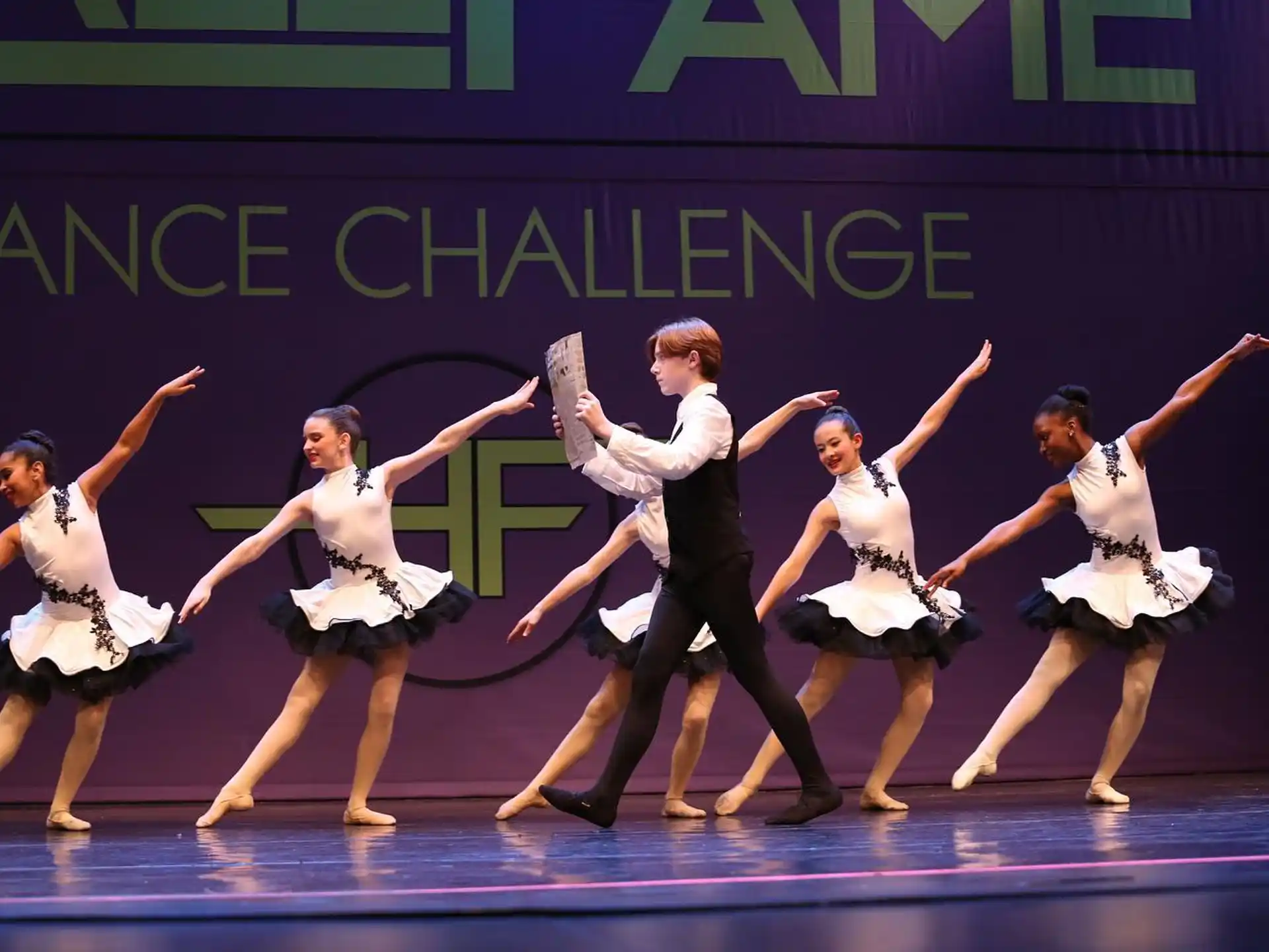 a group of women dancing on a stage