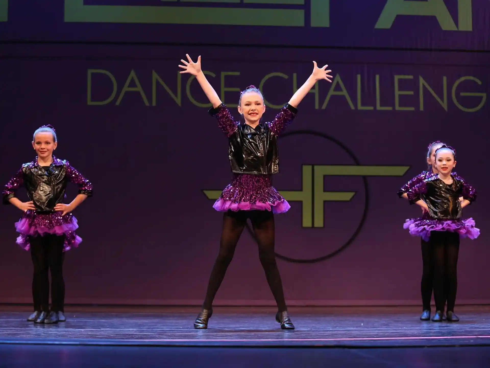a group of women on a stage