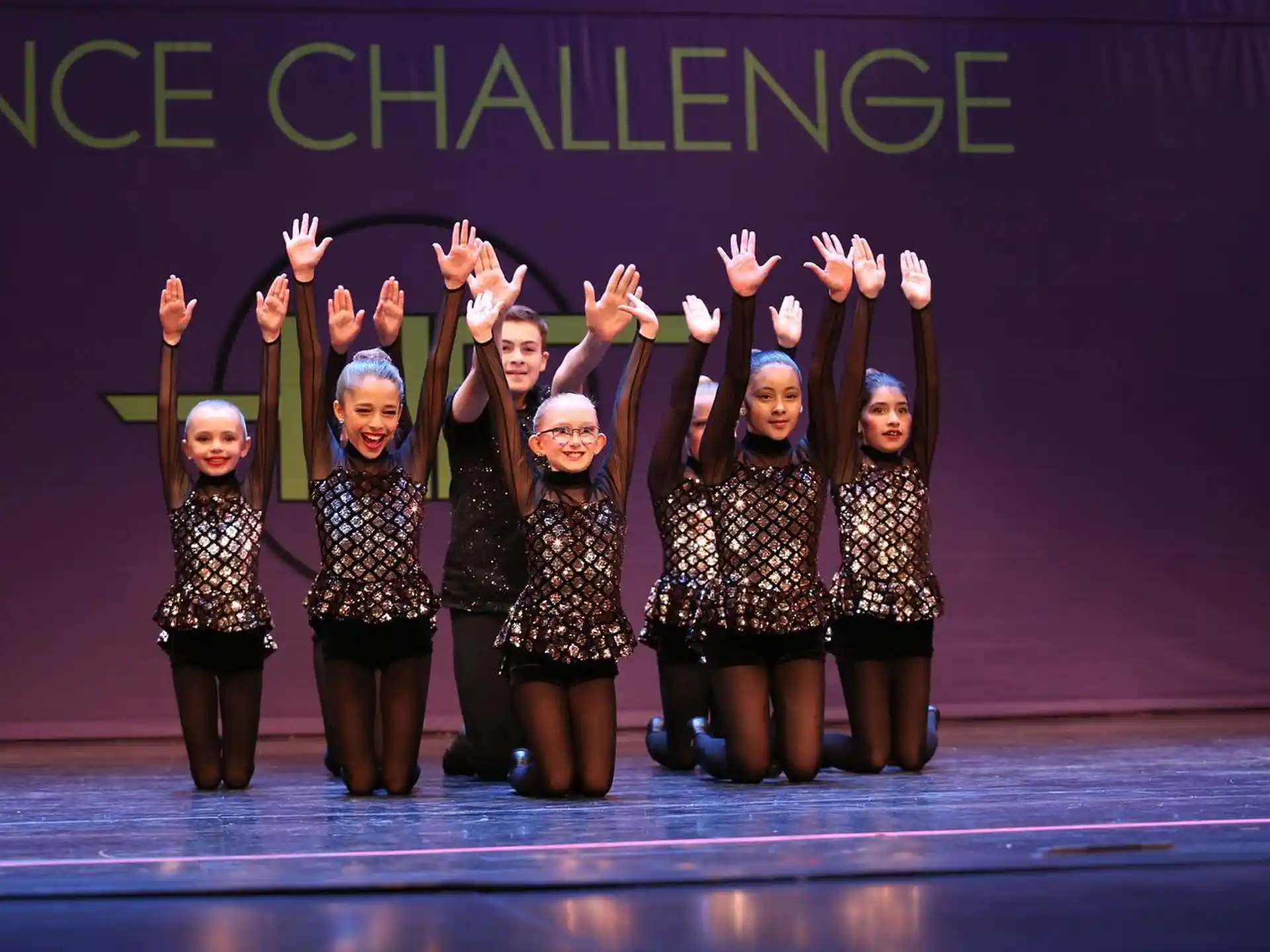 a group of women on a stage