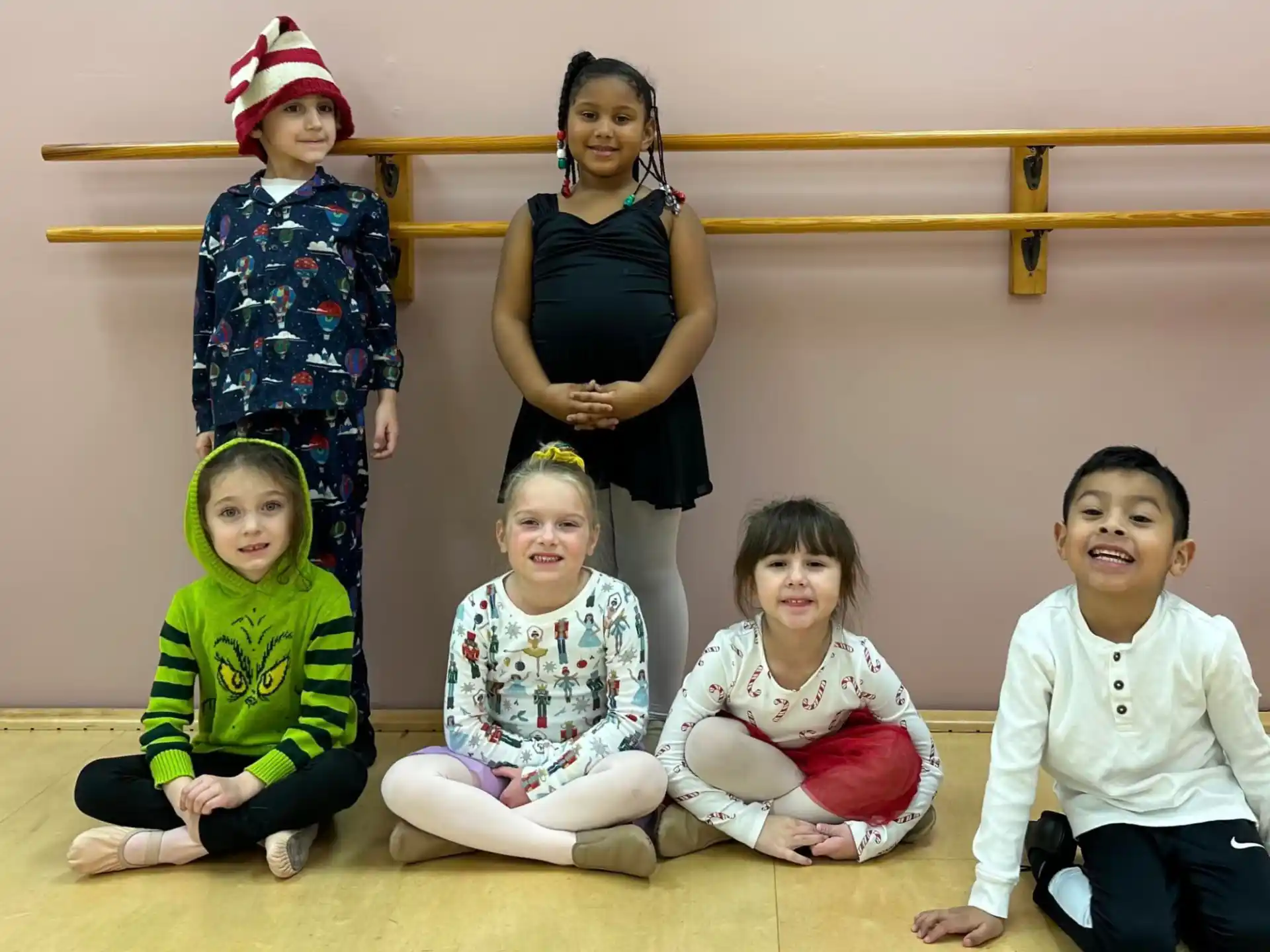 a group of children posing for a photo