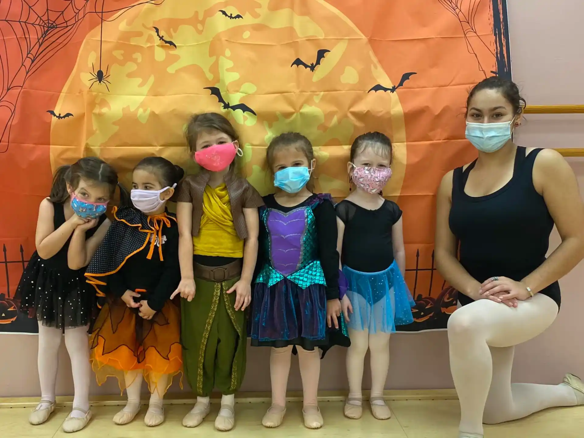 a group of children wearing clothing