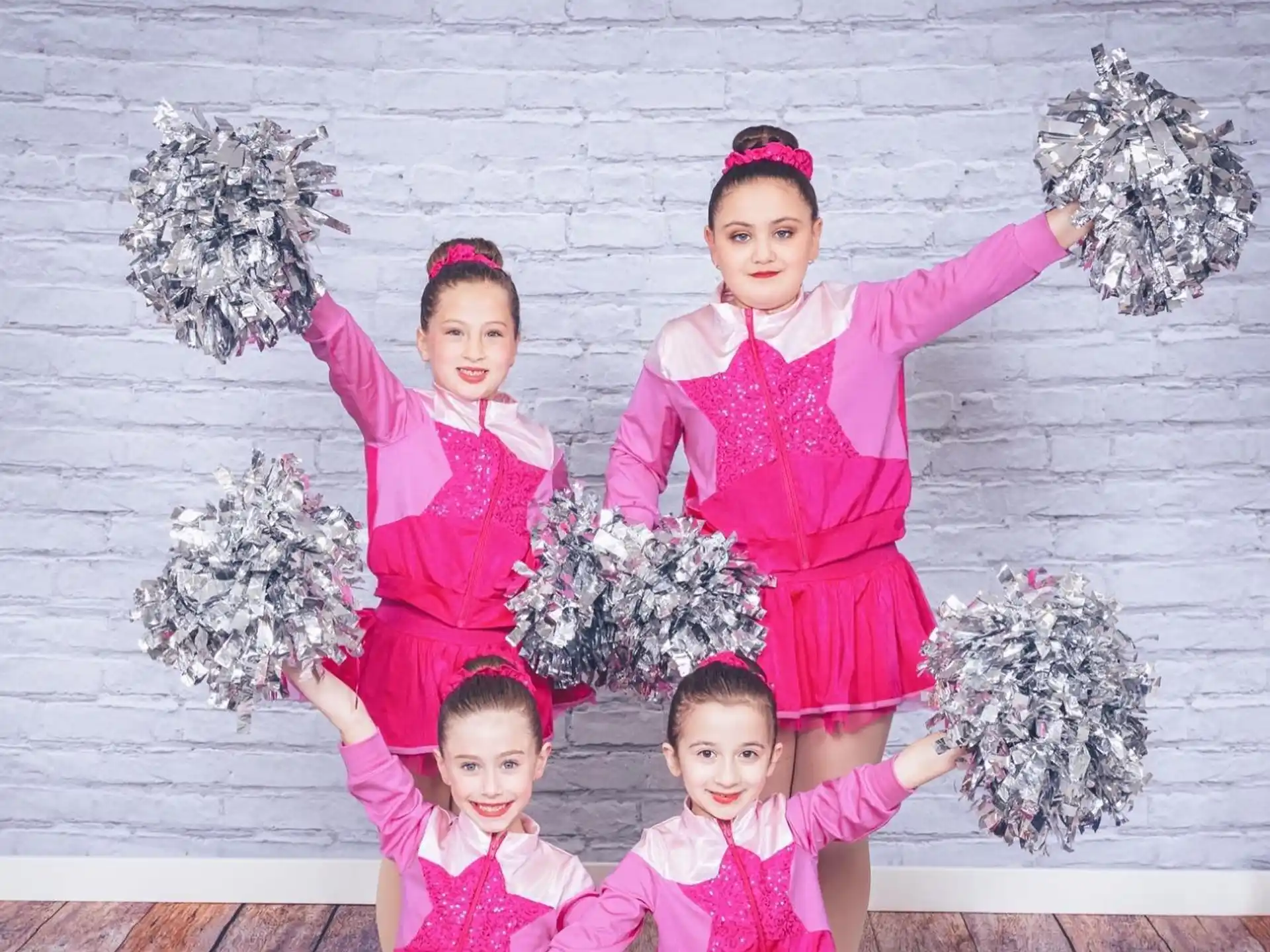 a group of children holding flowers