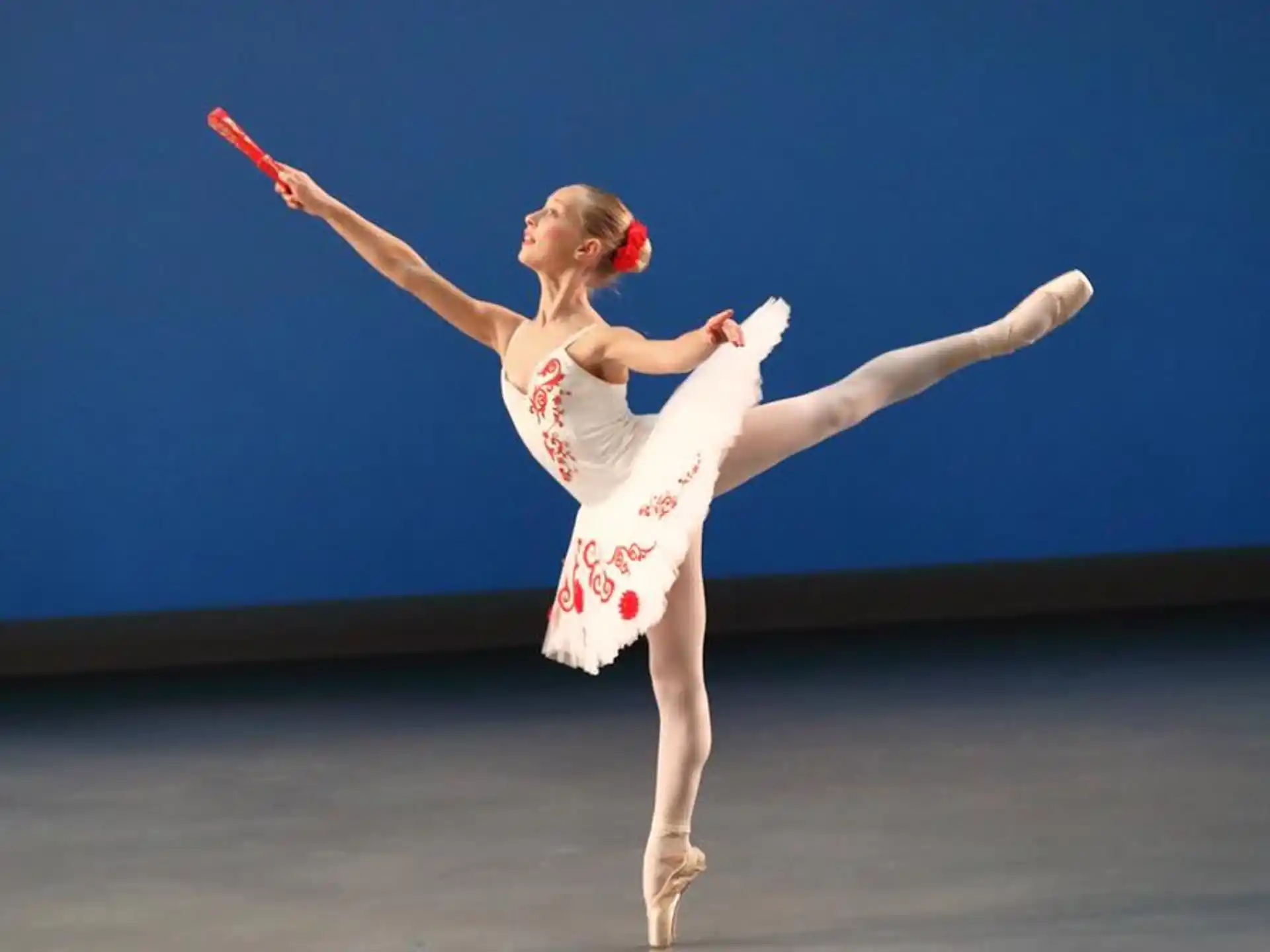 a woman dancing on a stage
