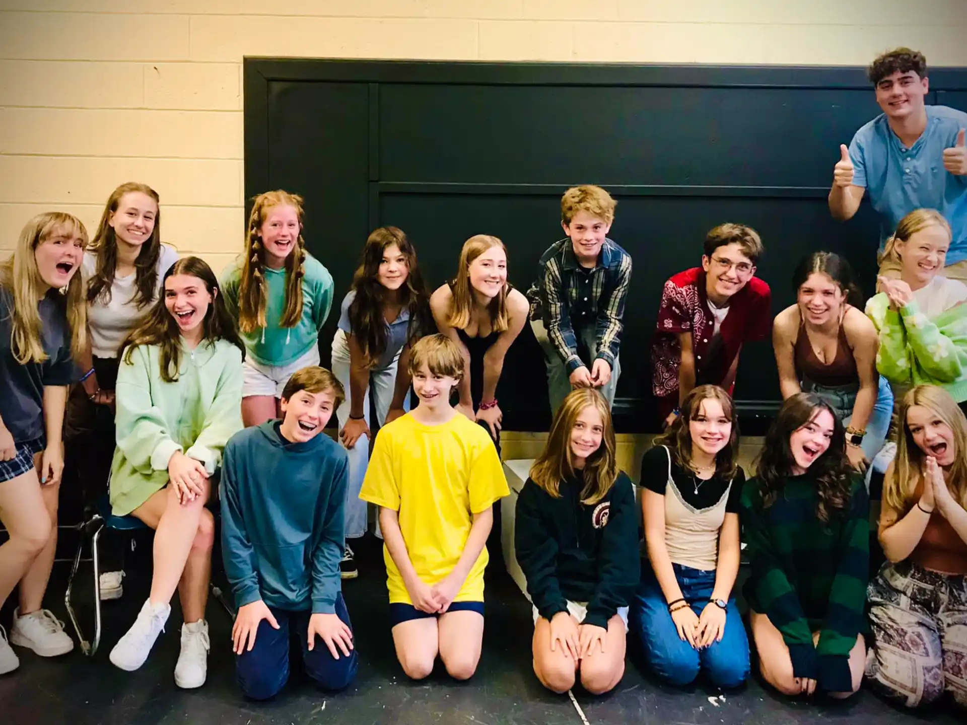 a group of people posing for a photo