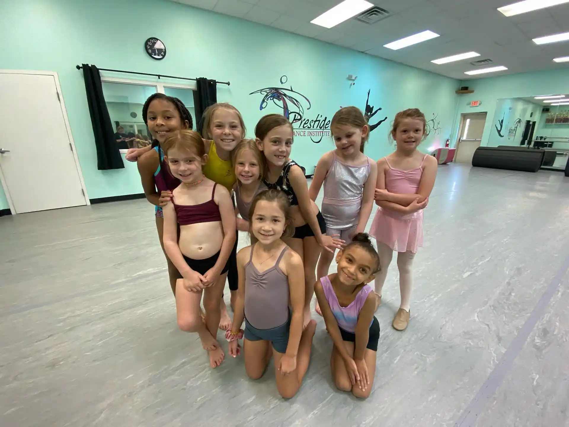 a group of girls posing for a photo