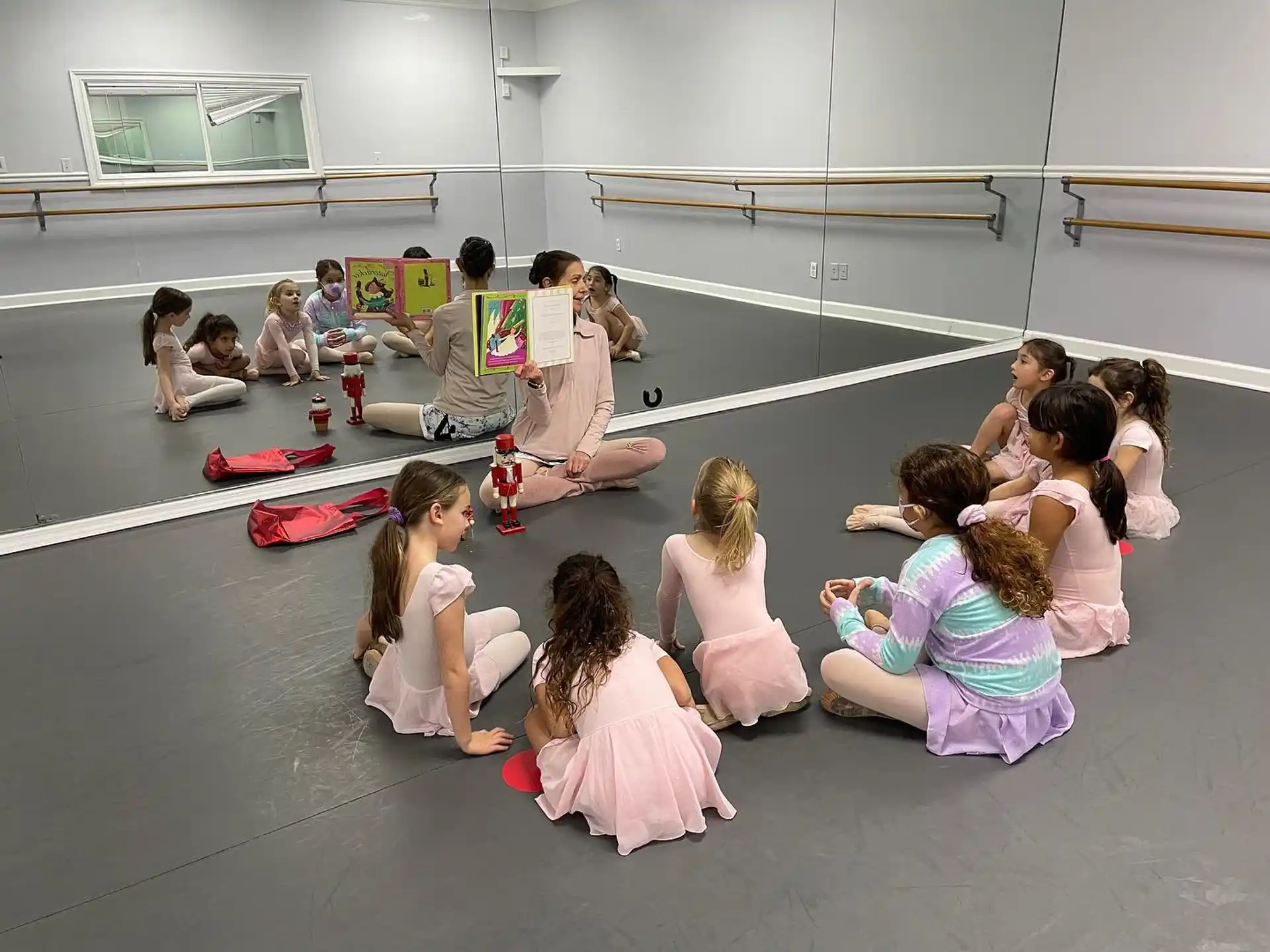 a group of people sitting on the floor
