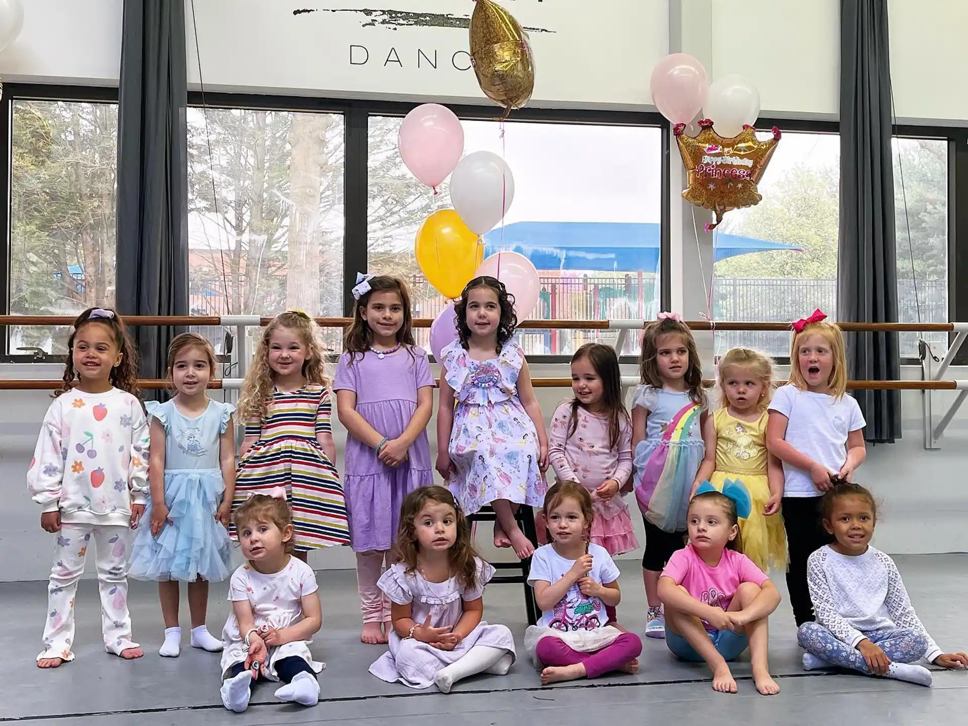 a group of children posing for a photo