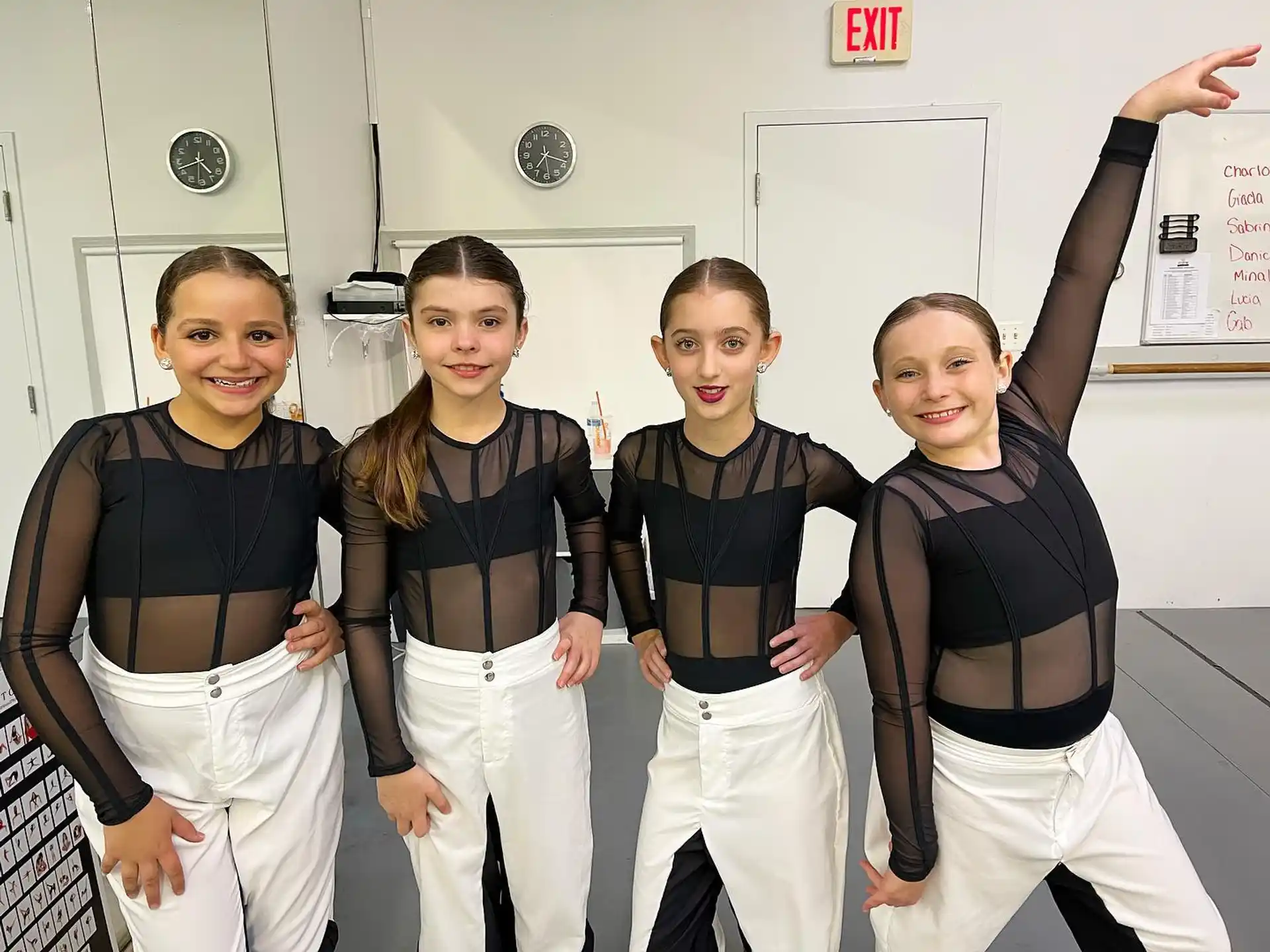 a group of girls posing for a photo