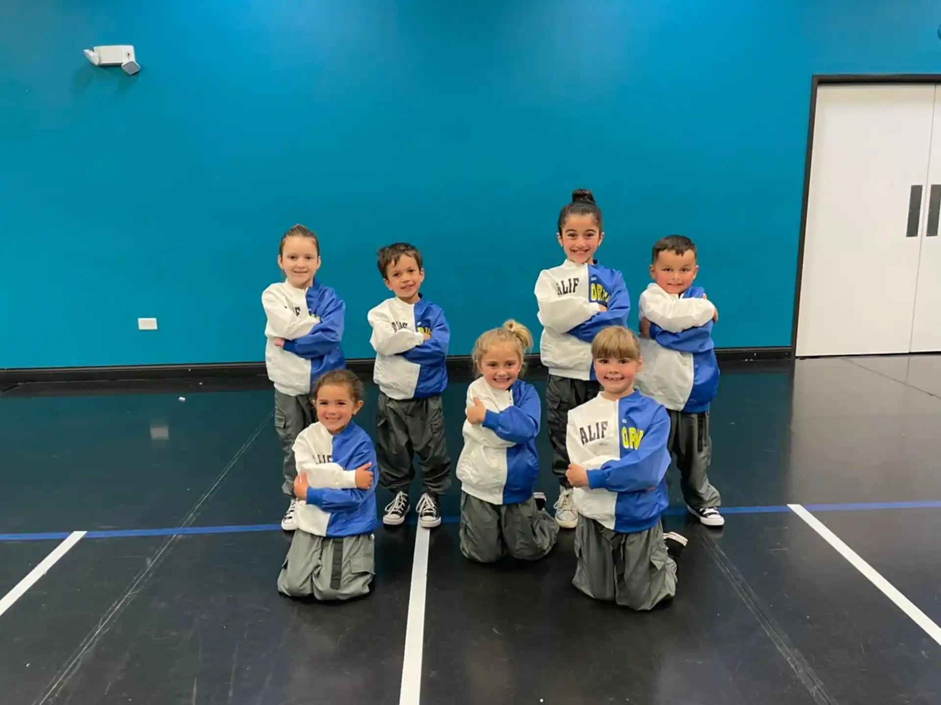 a group of children posing for a photo