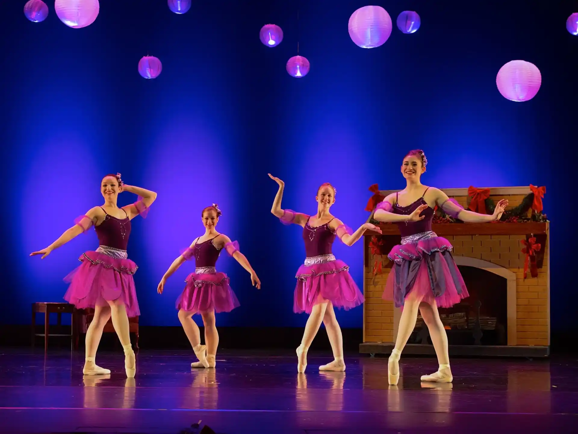 a group of women dancing on a stage