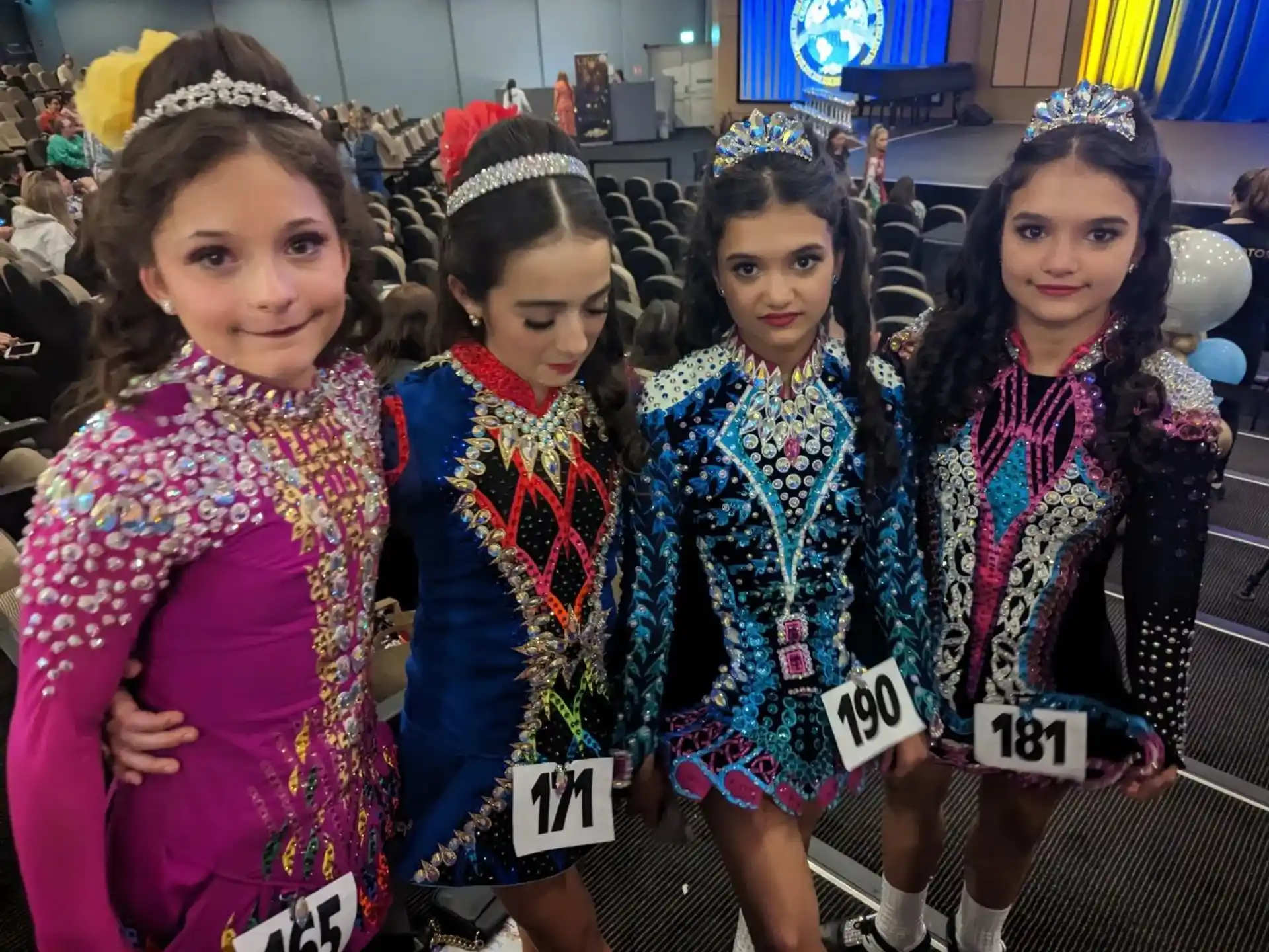 a group of girls wearing traditional clothing