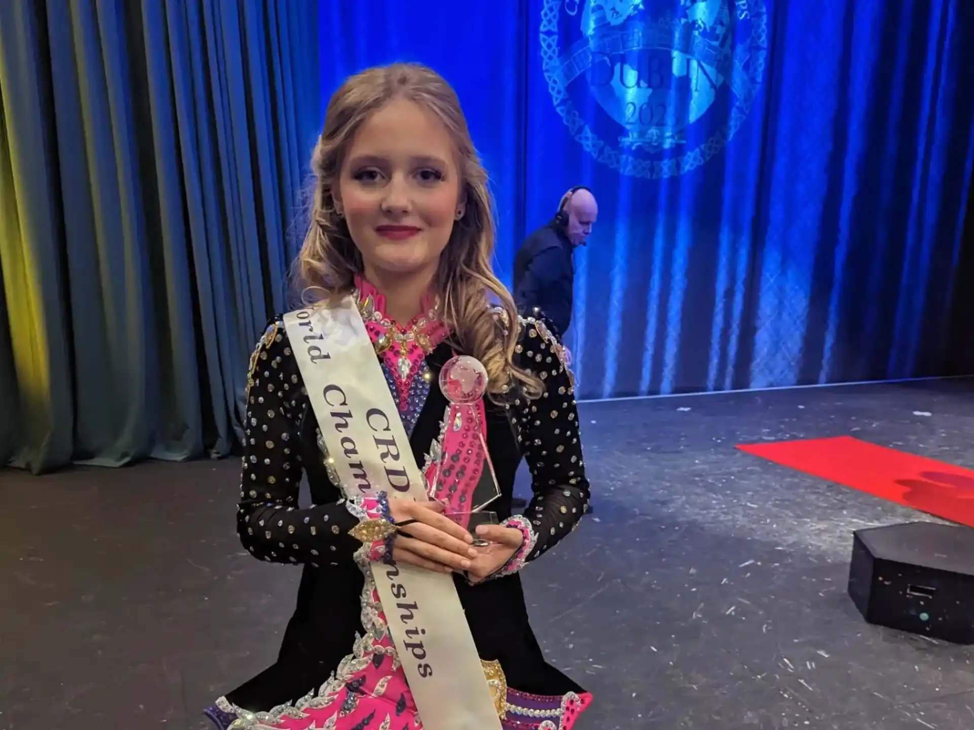 a person holding a trophy
