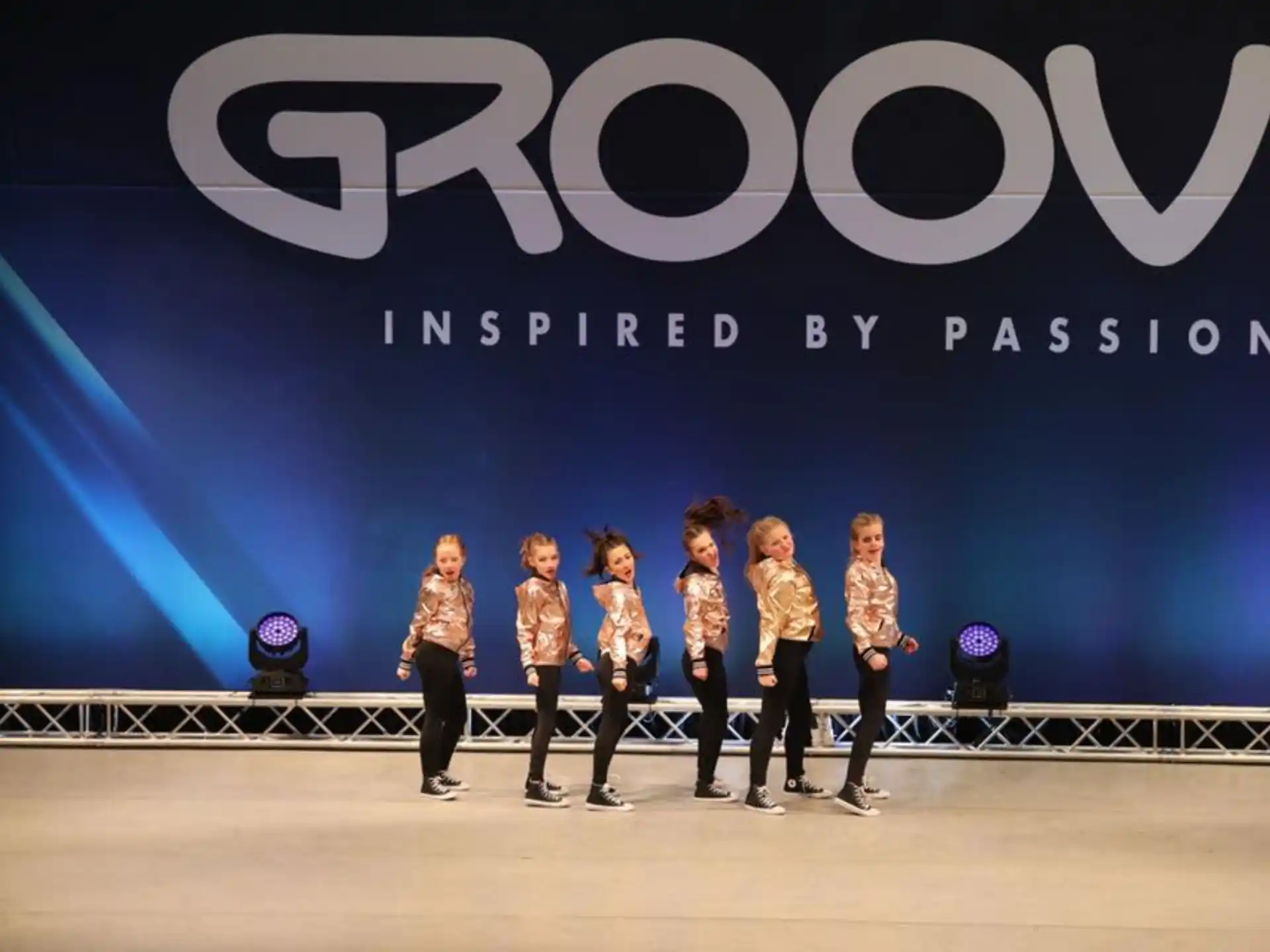 a group of people on a stage