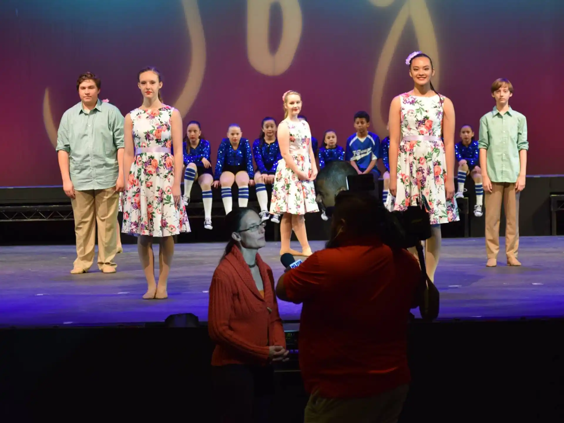 a group of people on a stage