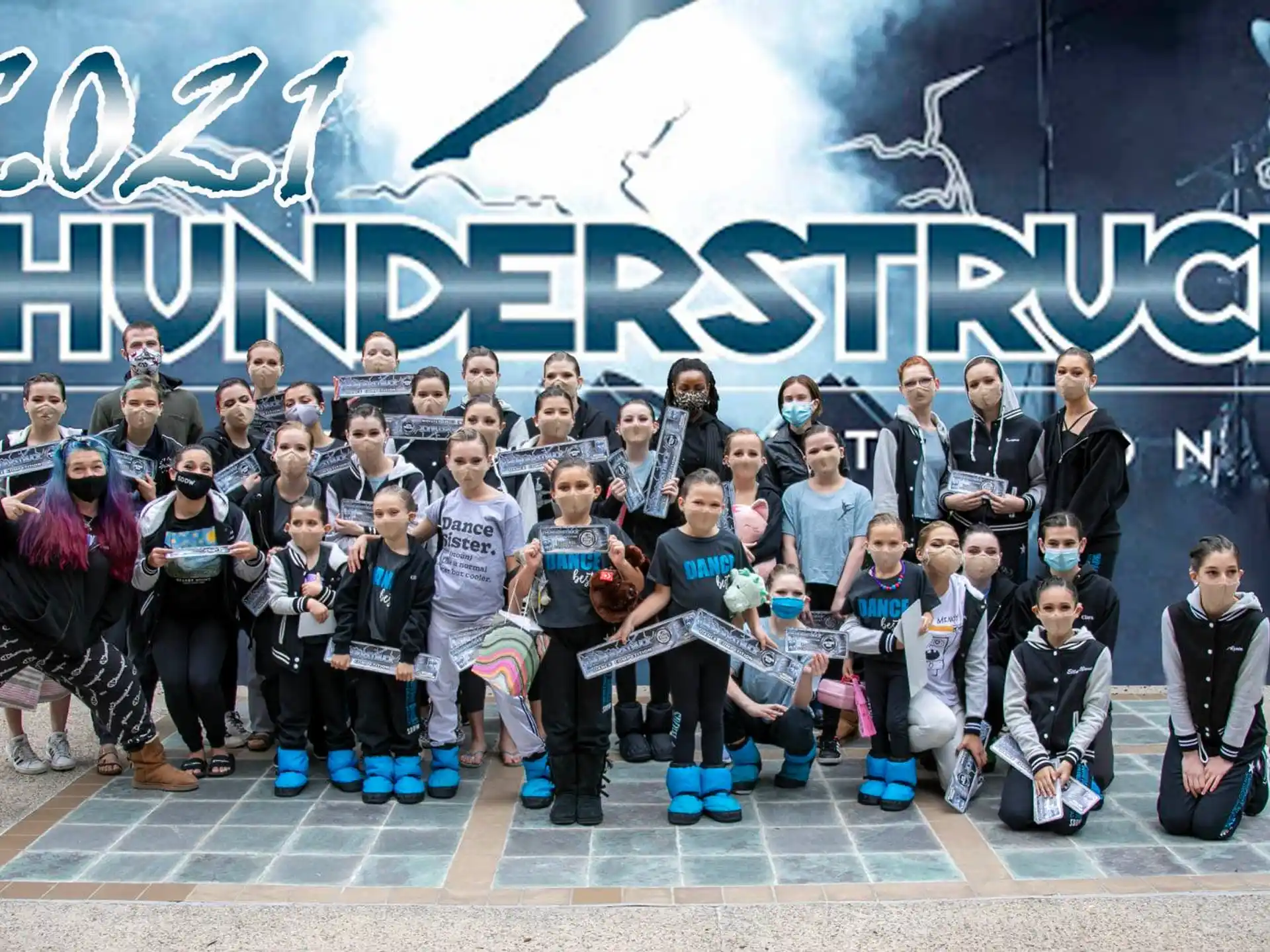 a group of people posing for a photo