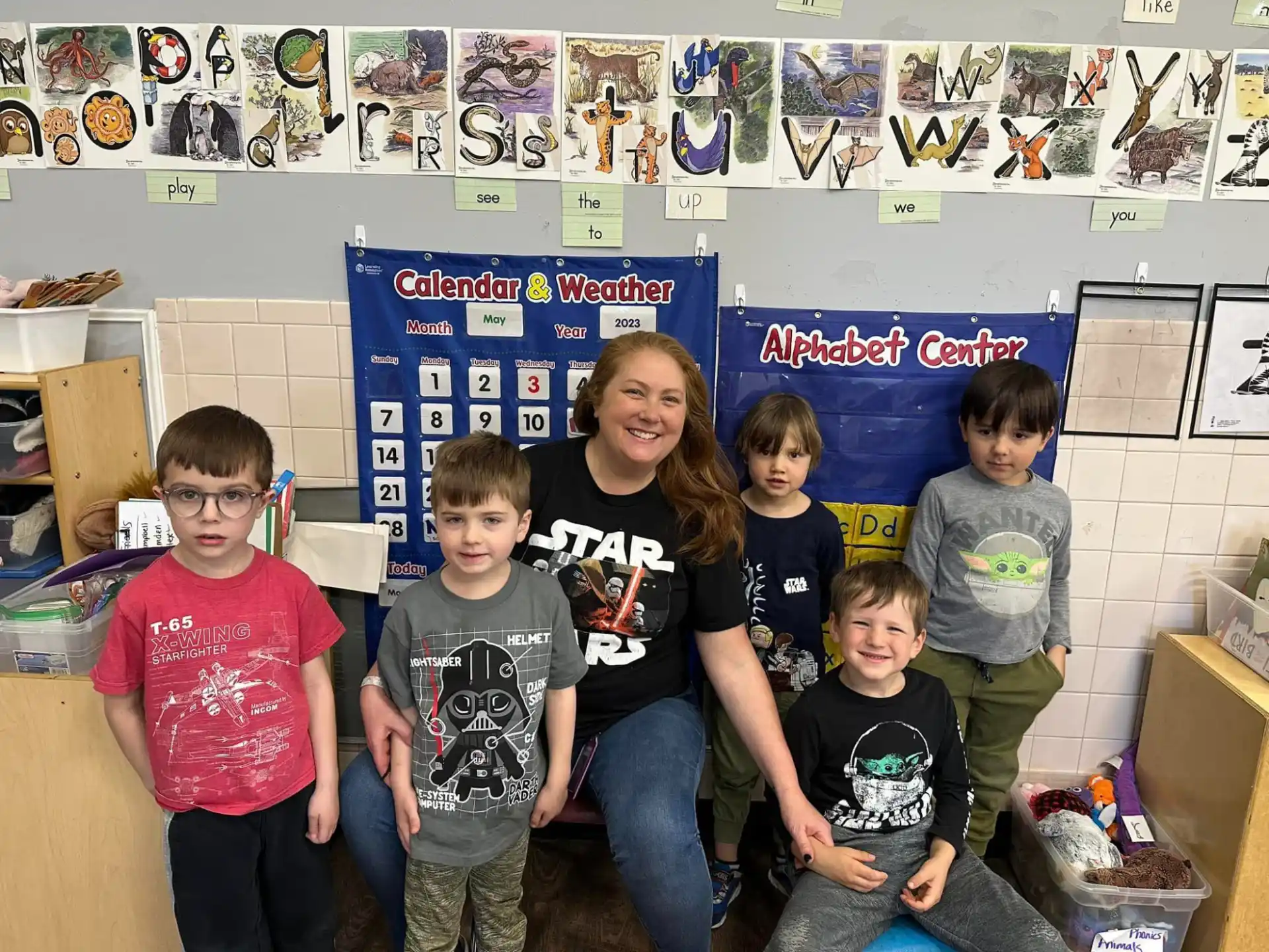 a group of children posing for a photo