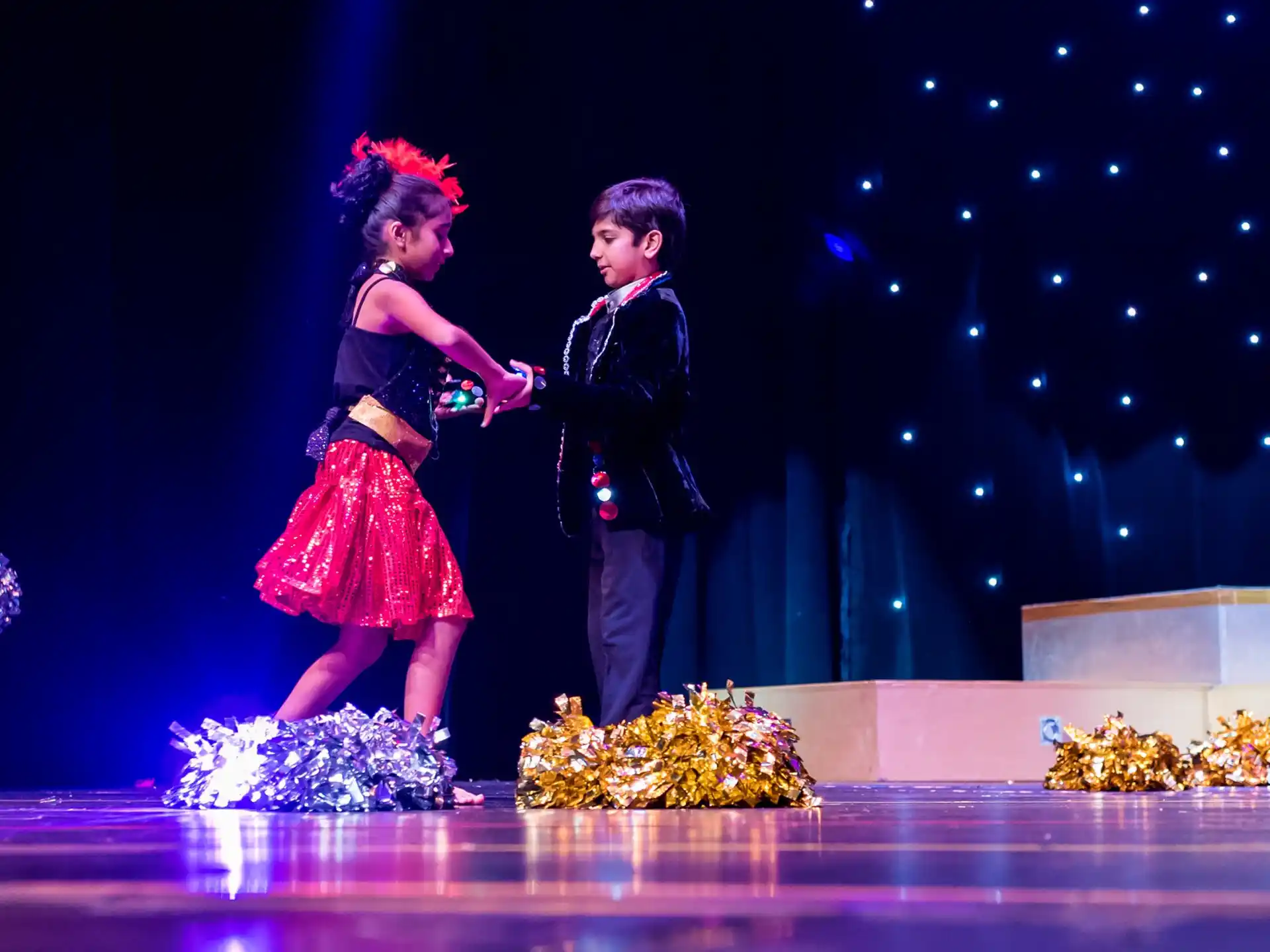 a man and woman on a stage
