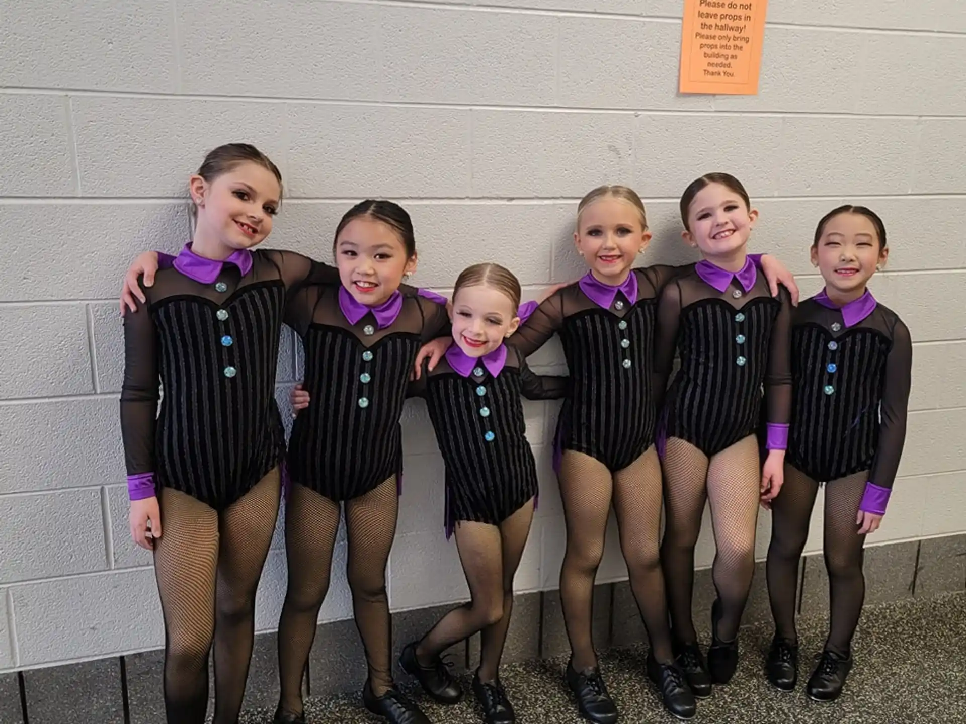 a group of girls in school uniforms