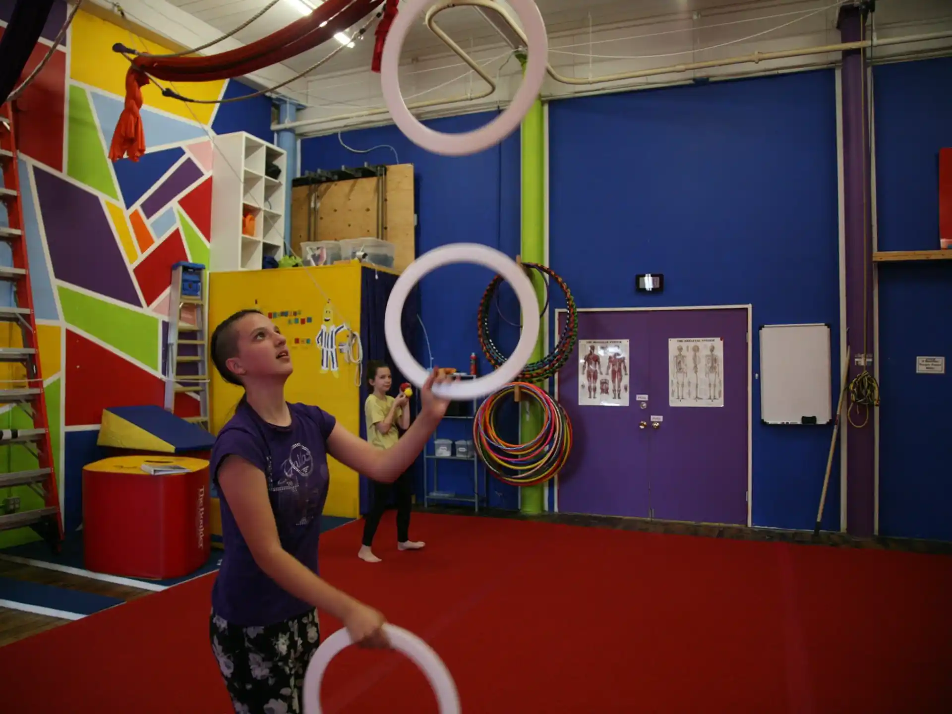 a woman holding a racket