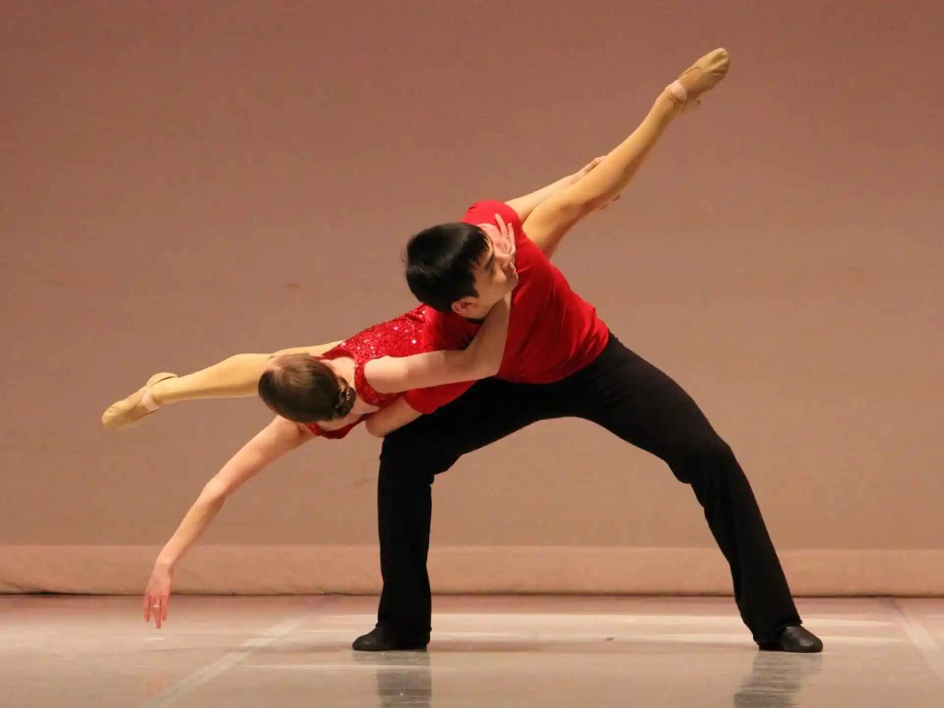 a man and woman dancing