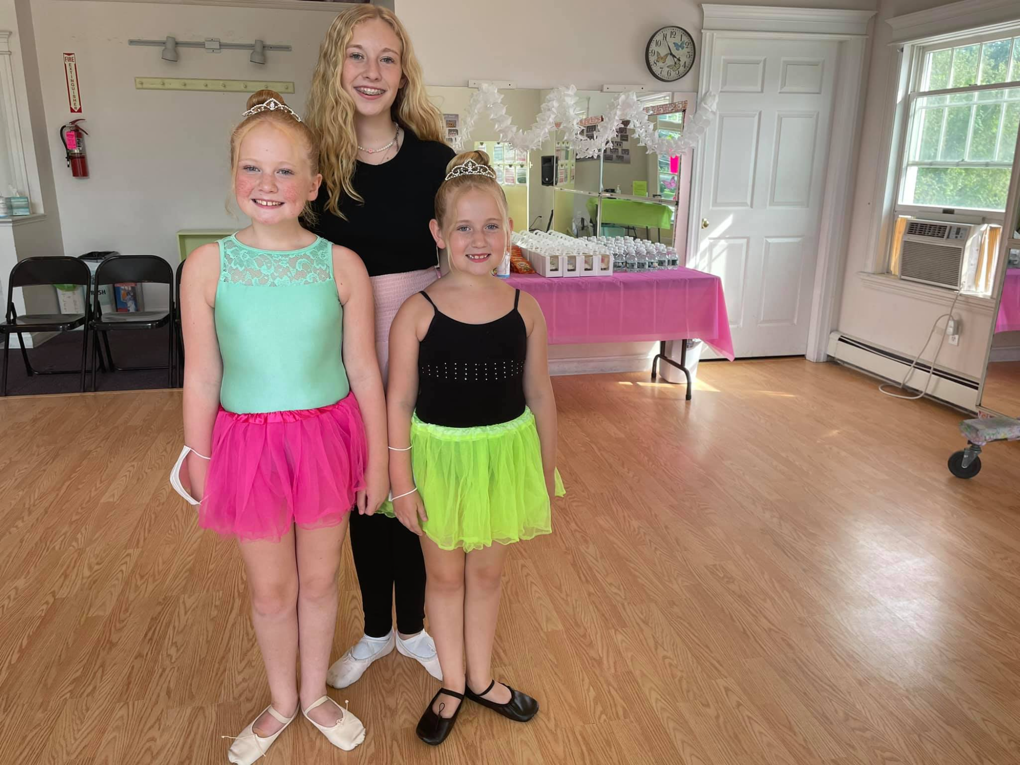 a group of girls posing for a picture