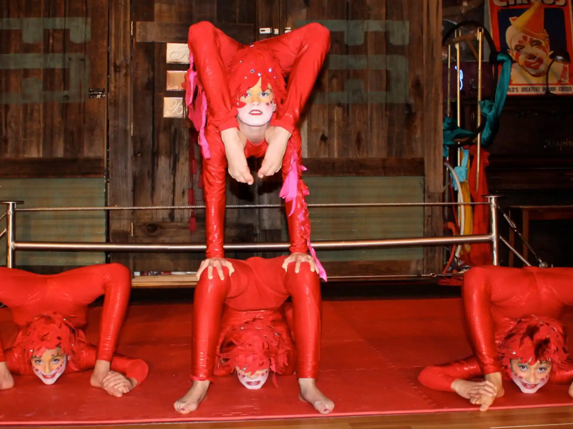 a group of people wearing red clothing