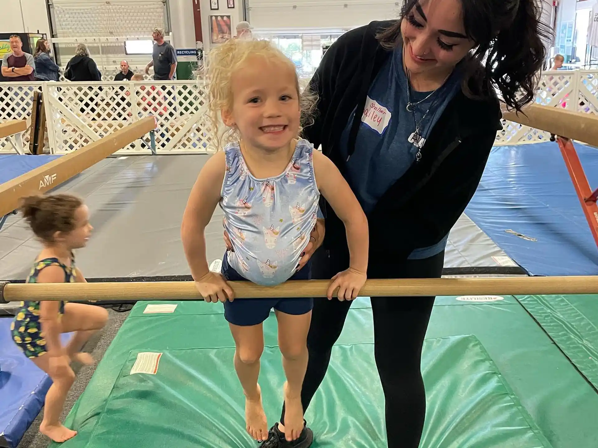 a person and a child on a trampoline