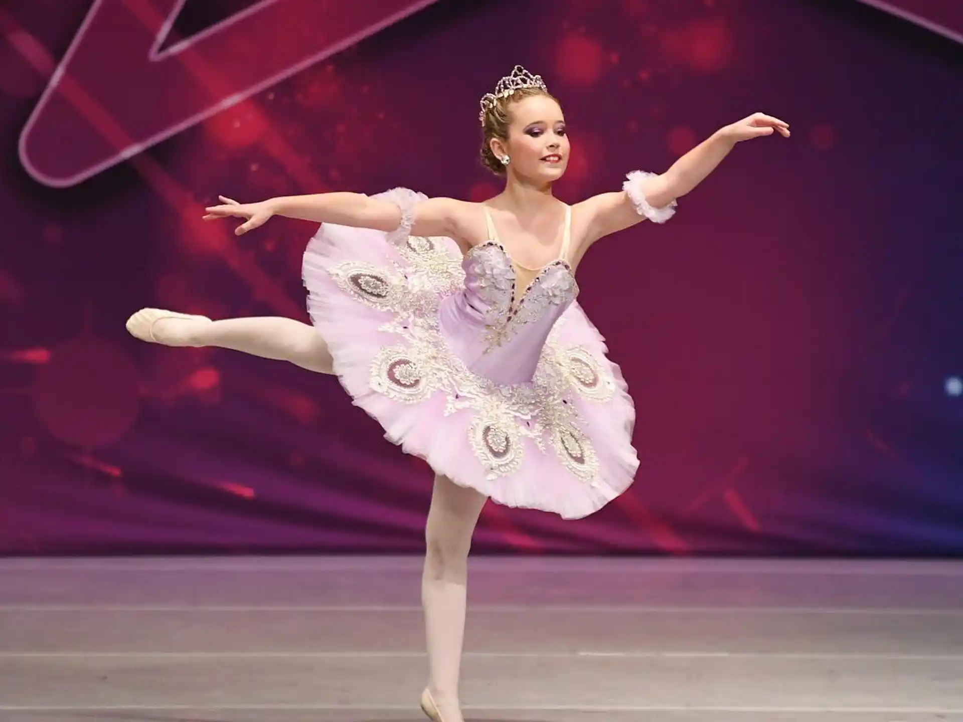 a woman dancing on a stage