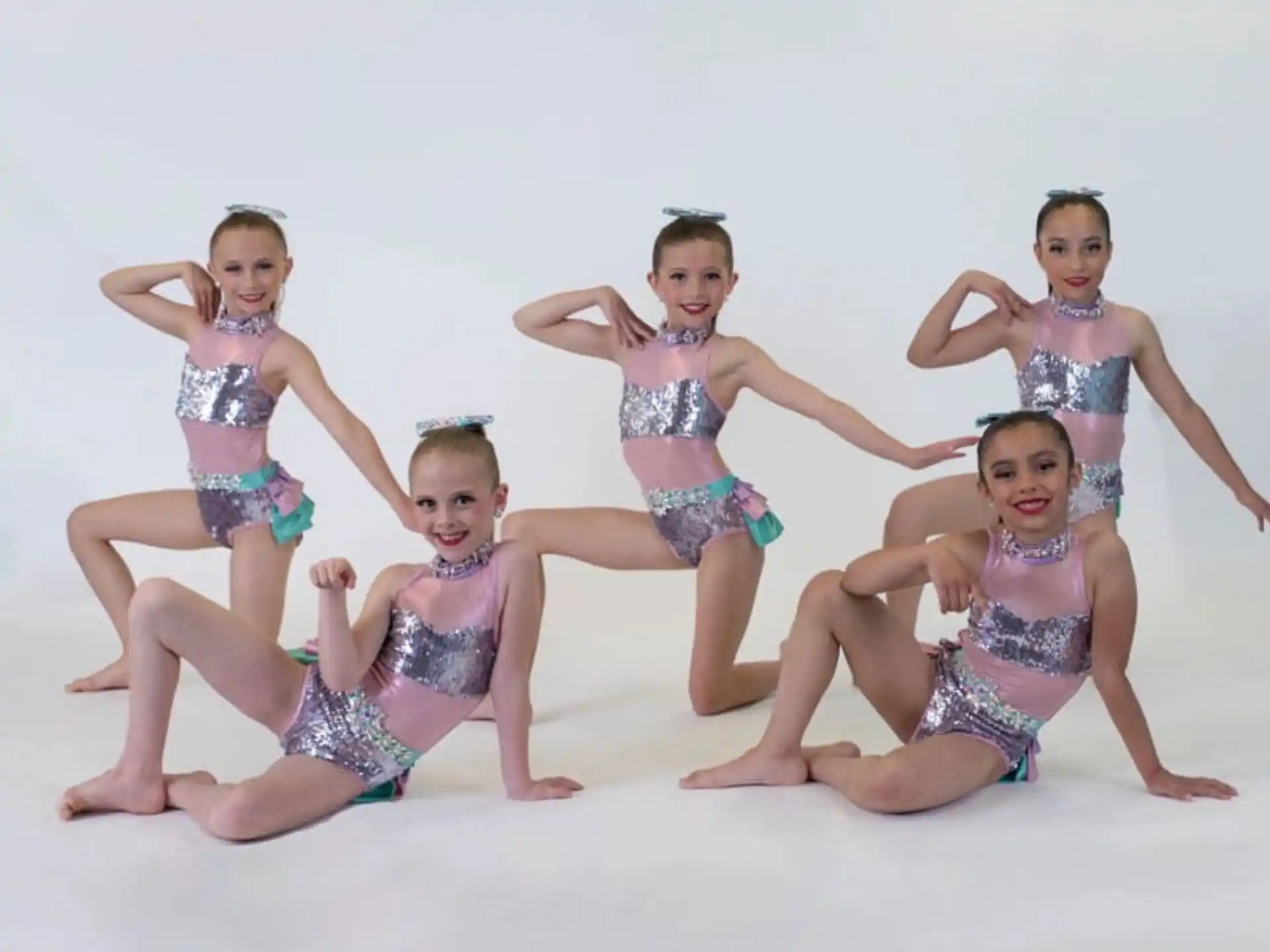 a group of children in swimsuits