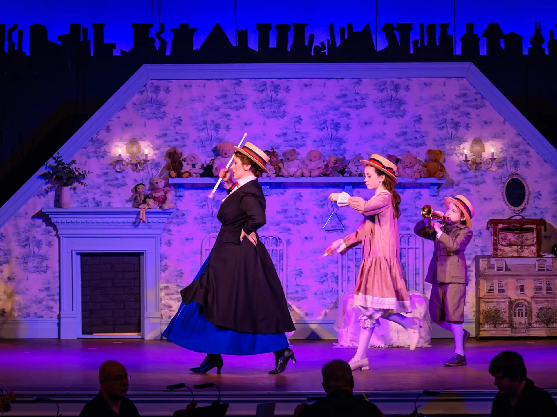 a group of people performing on a stage
