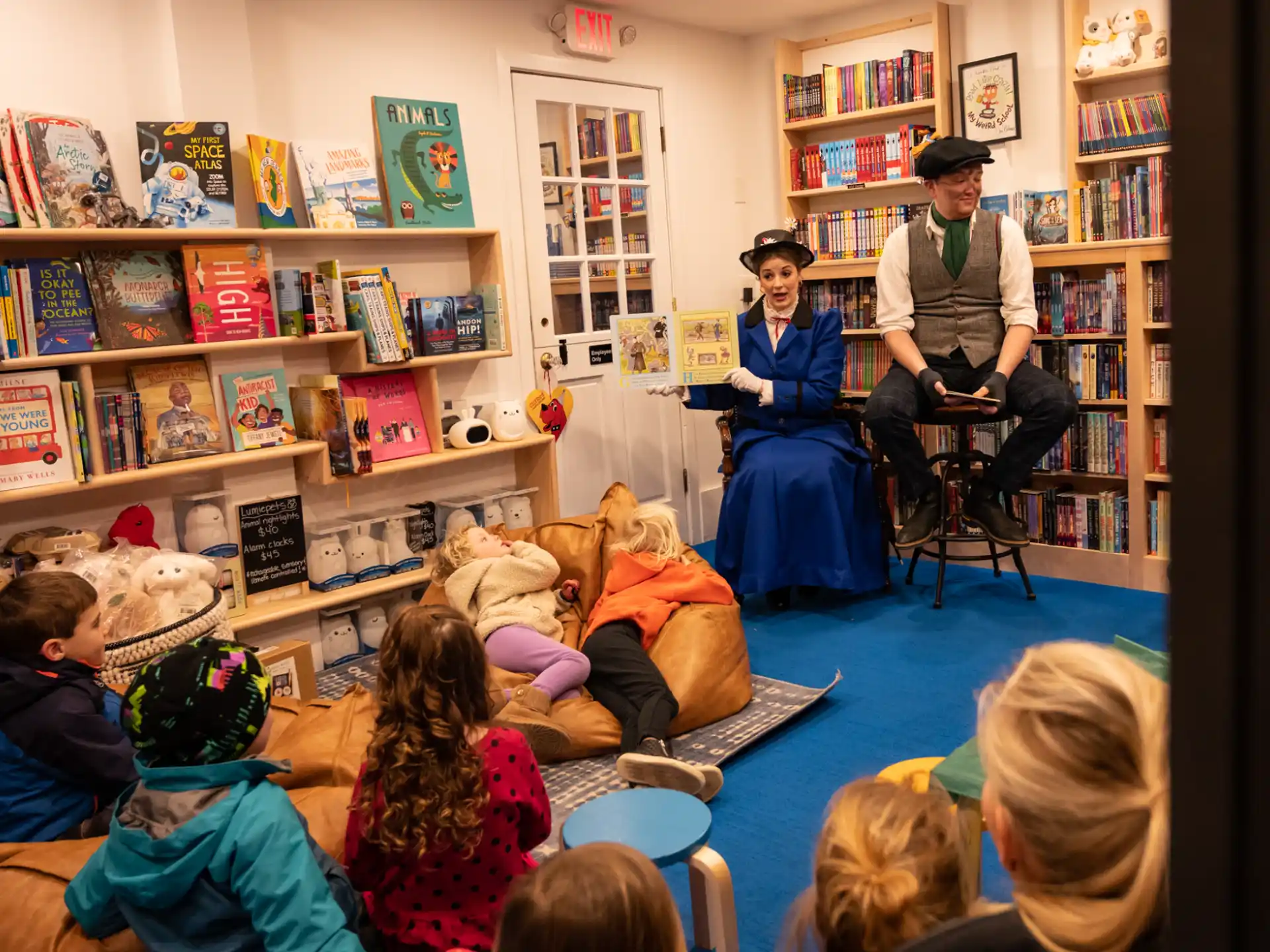a group of people sitting in a library