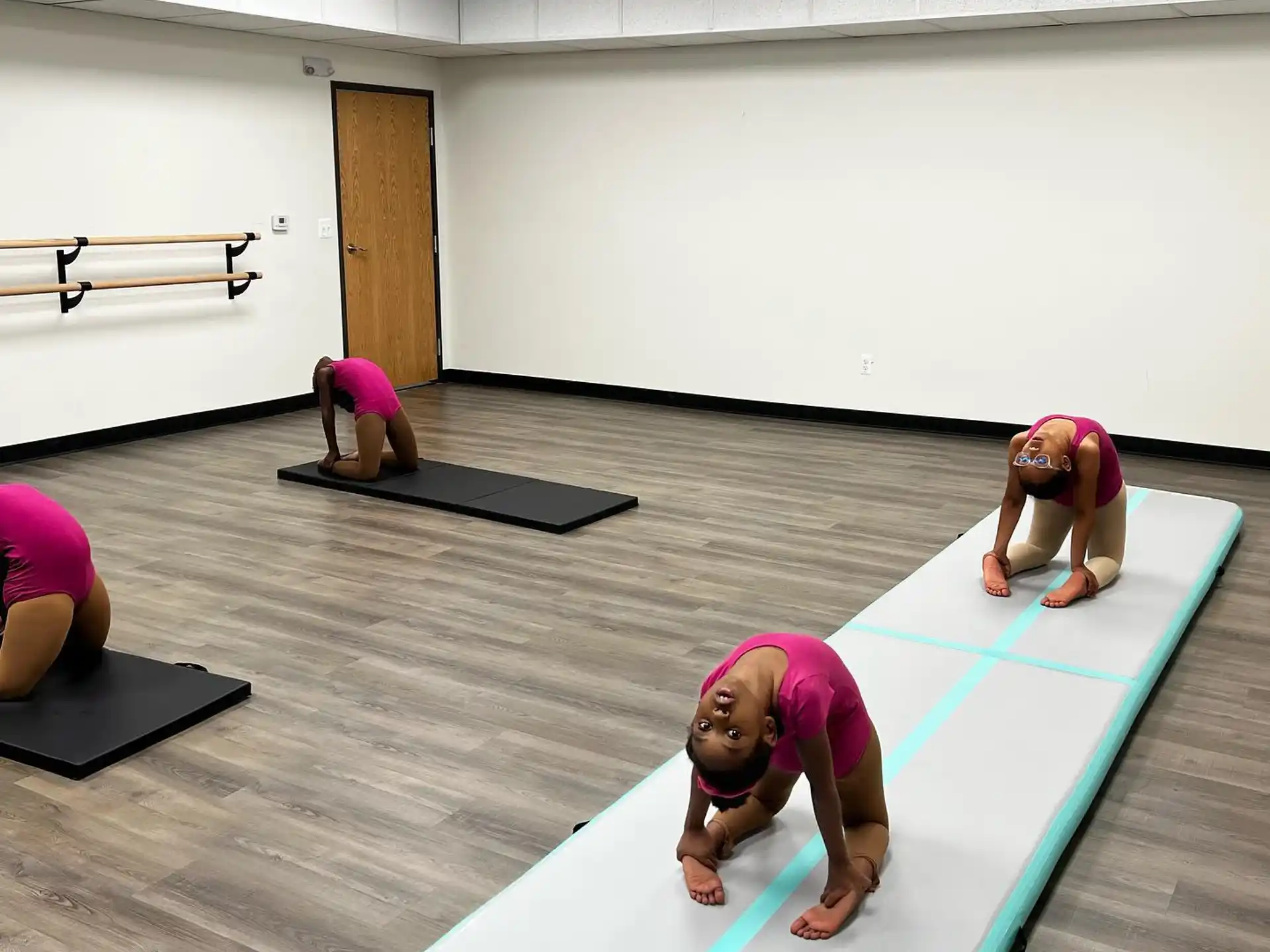 a group of people doing yoga
